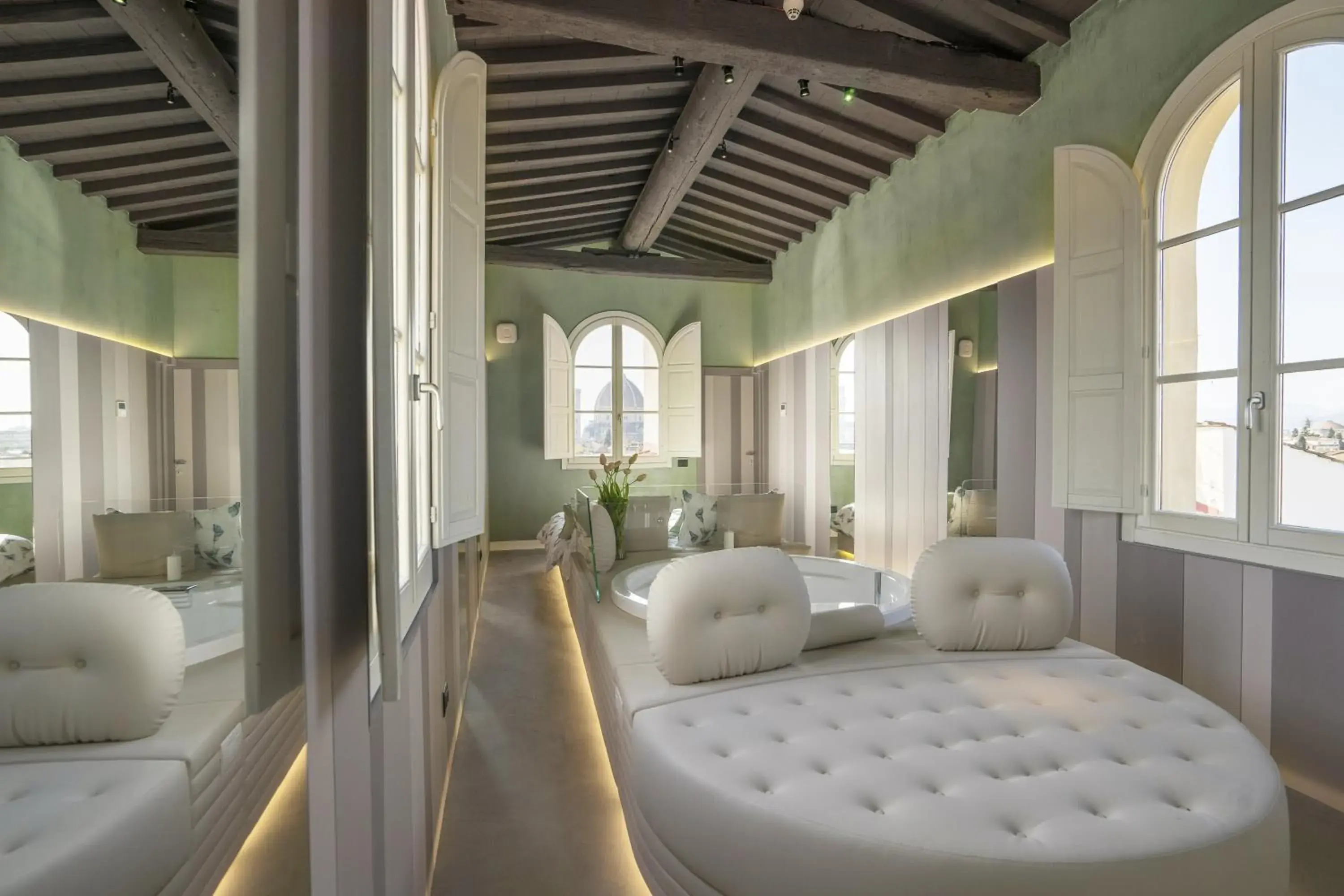 Bedroom in Palazzo dei Ciompi Suites Bedroom in Palazzo dei Ciompi Suites