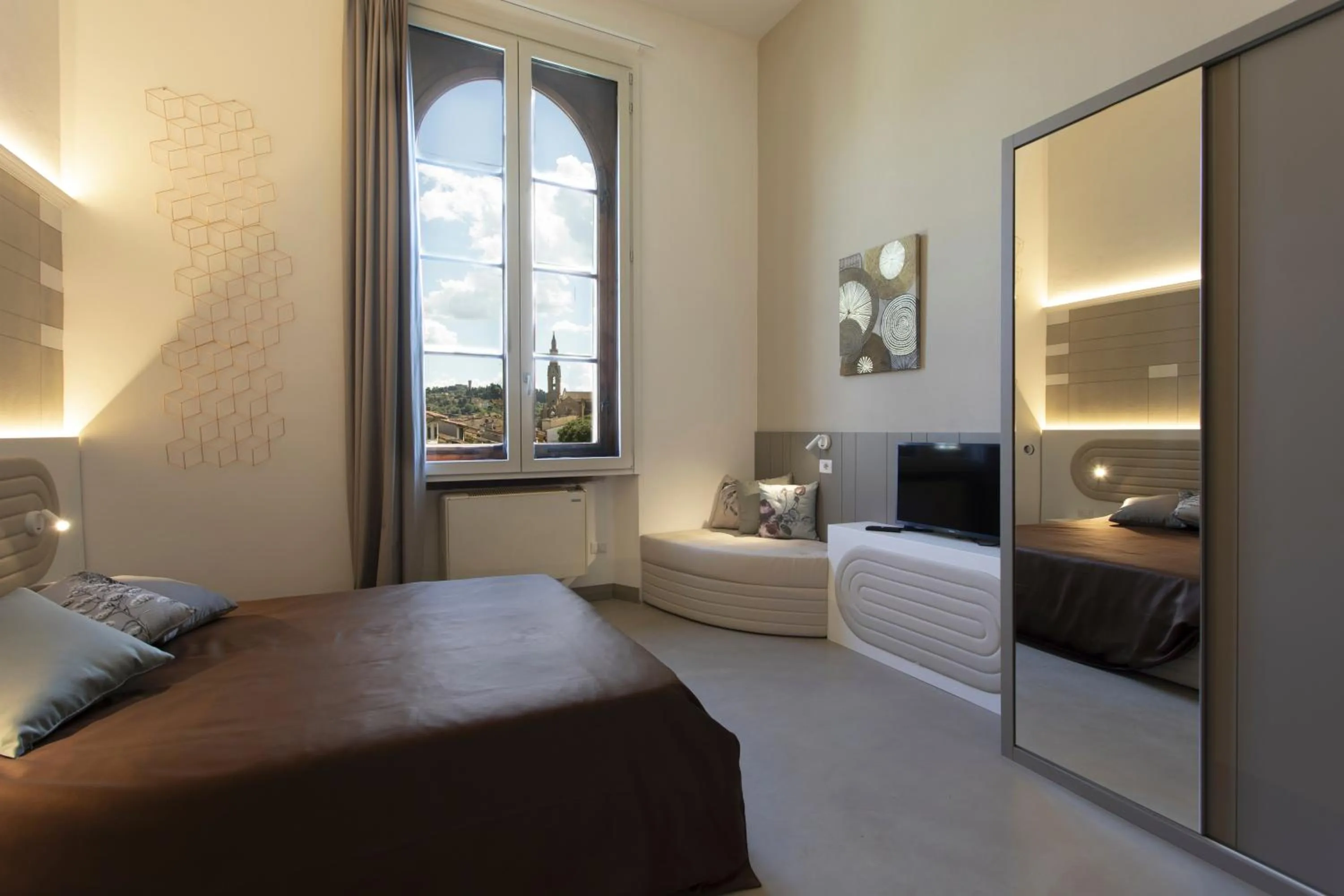 Bed in Palazzo dei Ciompi Suites