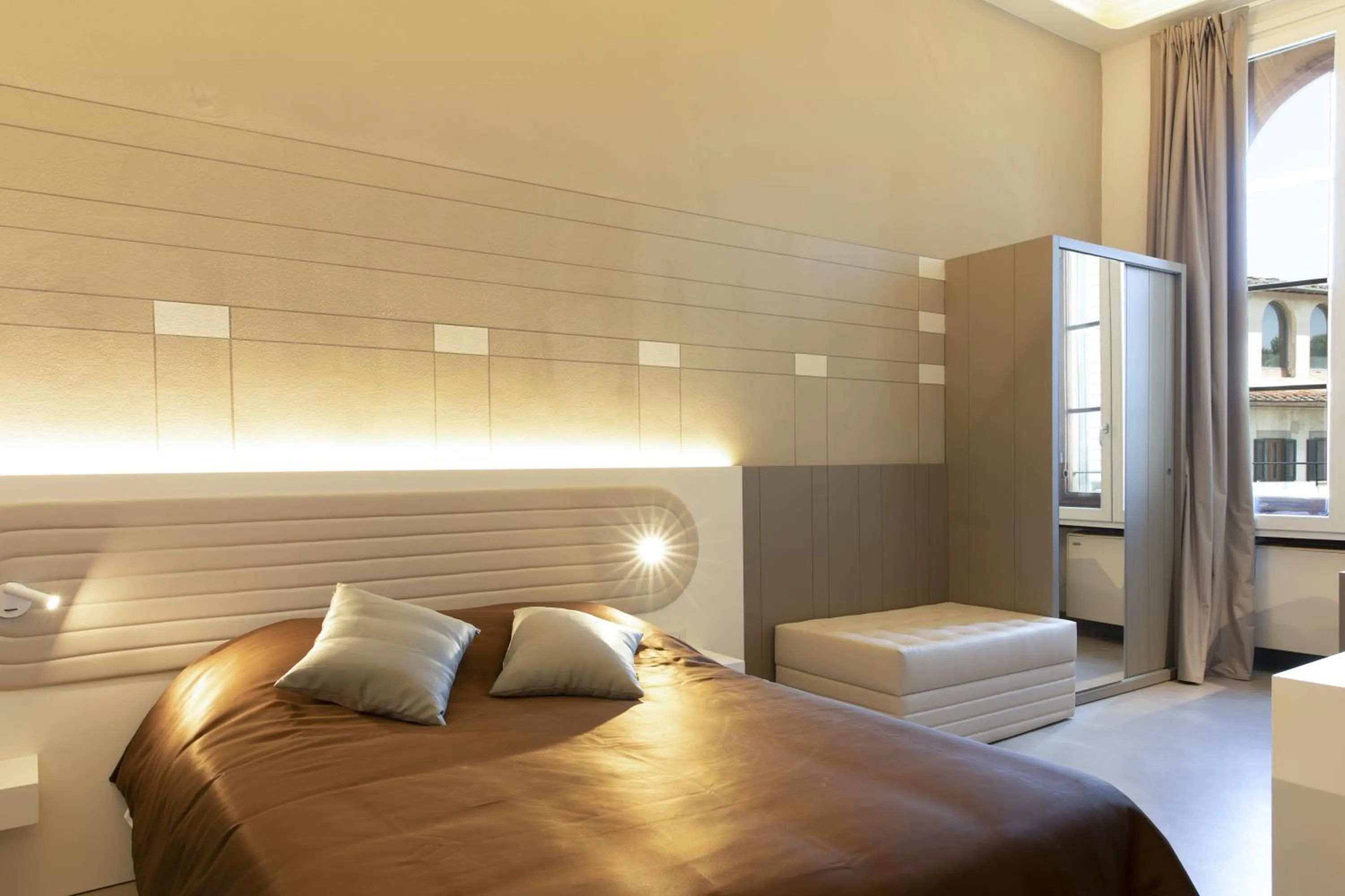 Bed in Palazzo dei Ciompi Suites