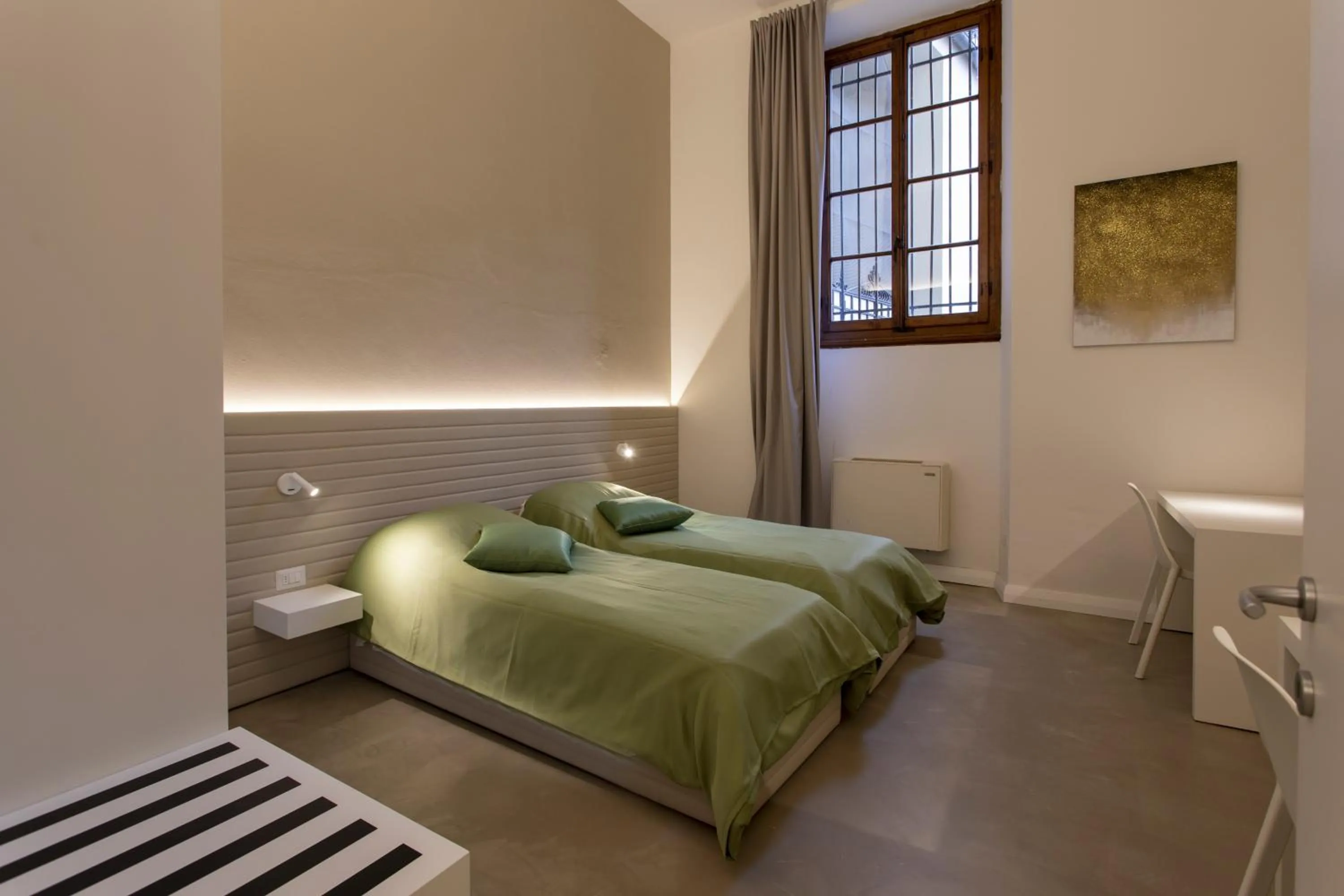 Bed in Palazzo dei Ciompi Suites