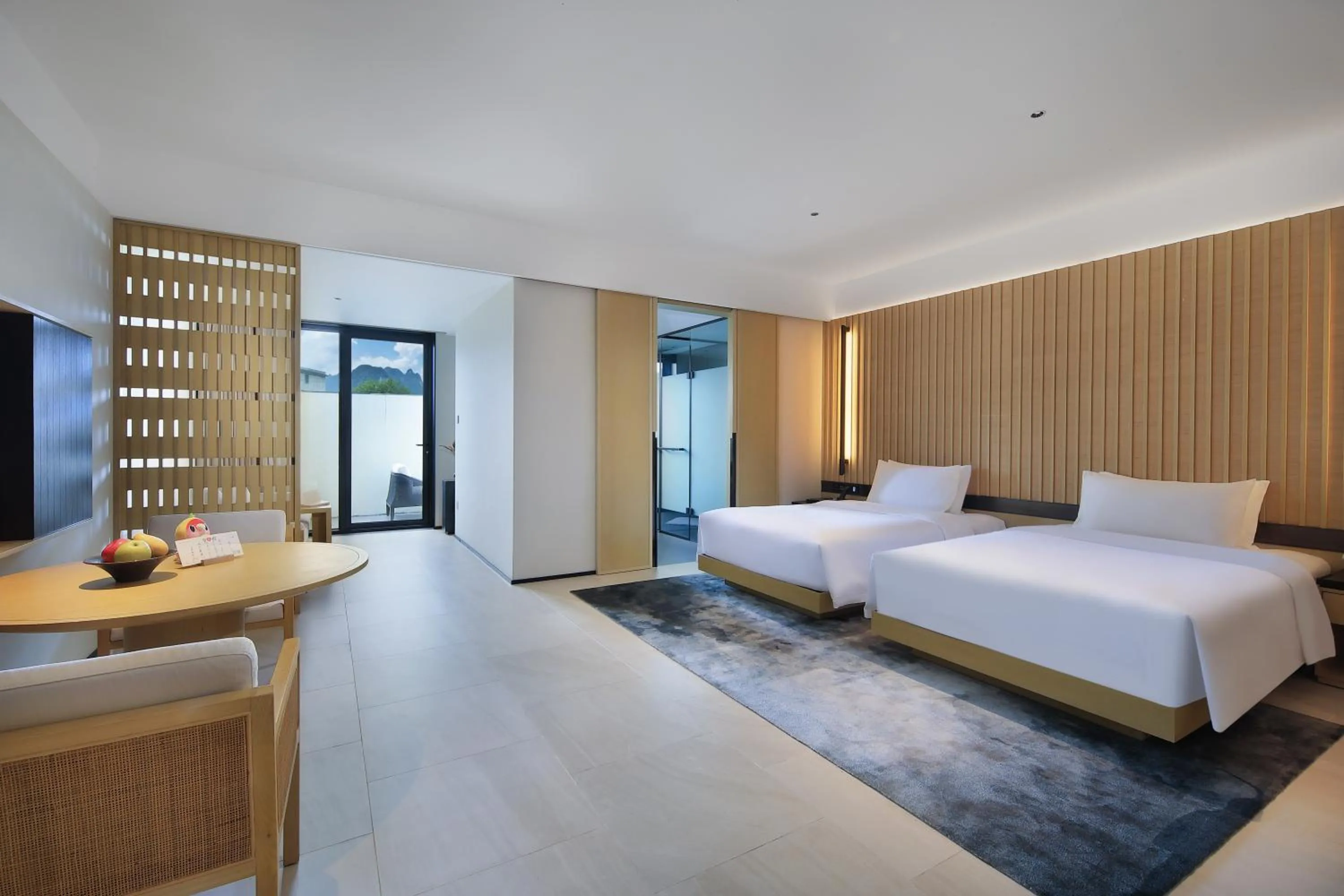 Photo of the whole room, Bed in Guilin Yangshuo Jora Hotel