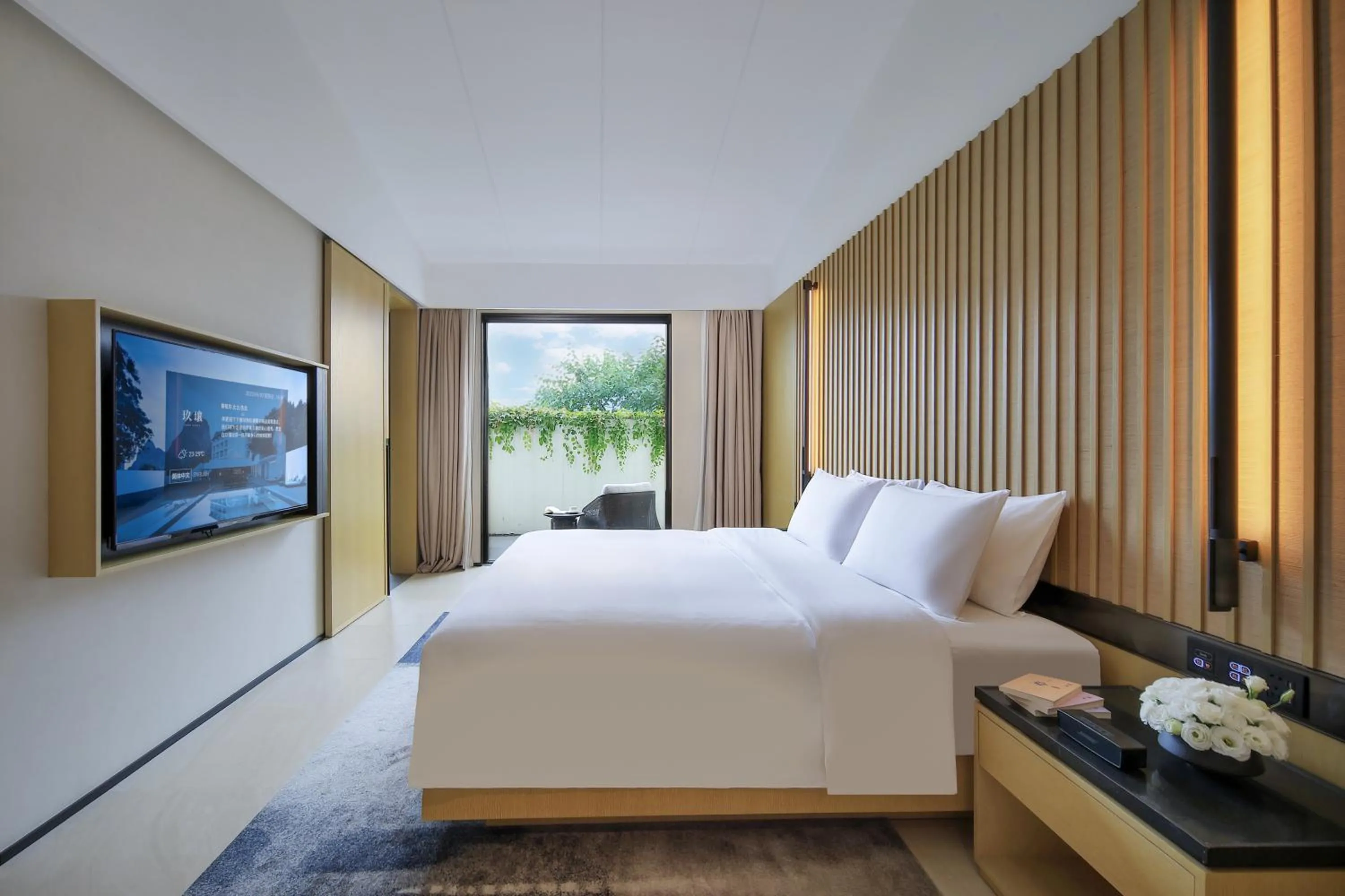Photo of the whole room, Bed in Guilin Yangshuo Jora Hotel