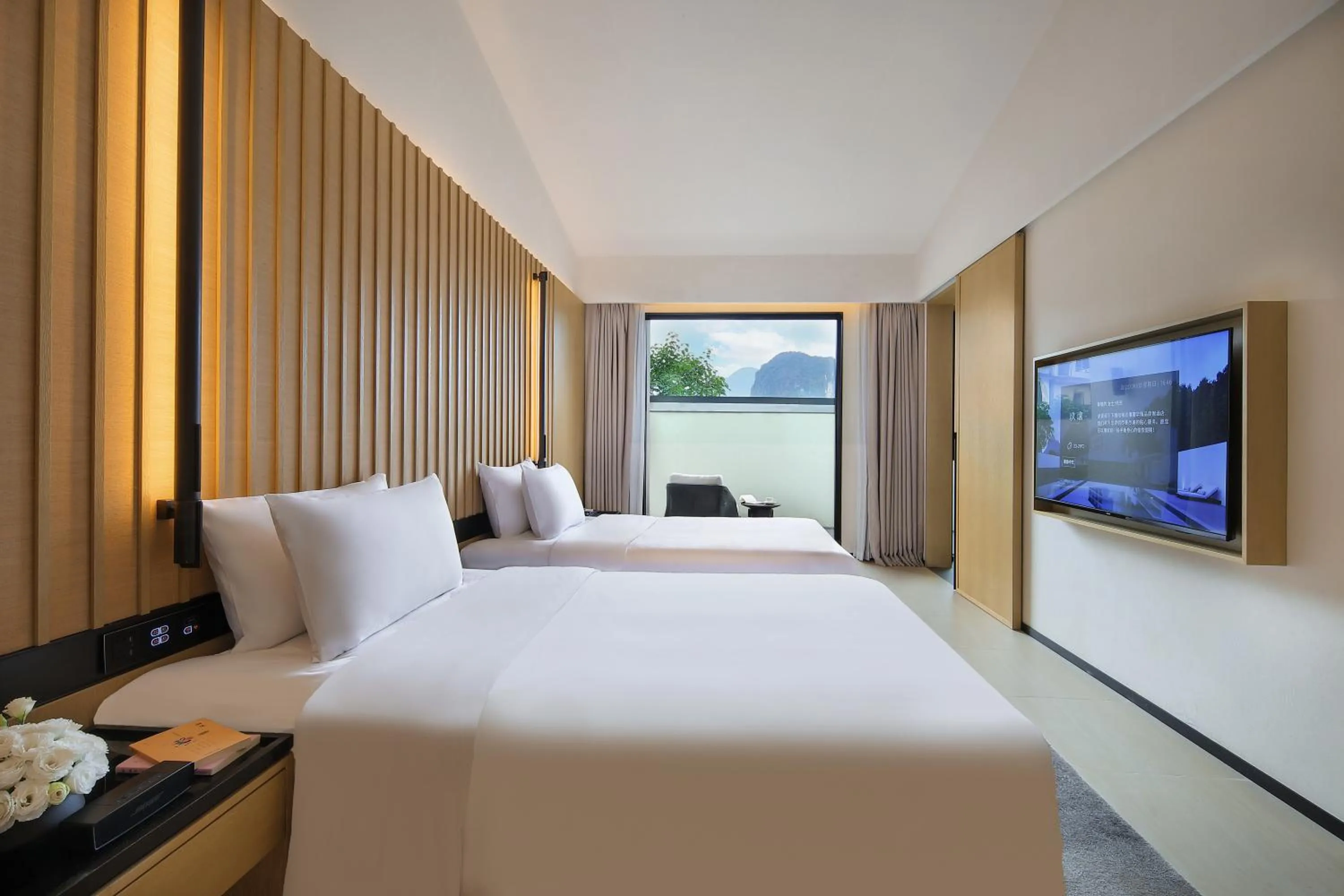 Bed in Guilin Yangshuo Jora Hotel