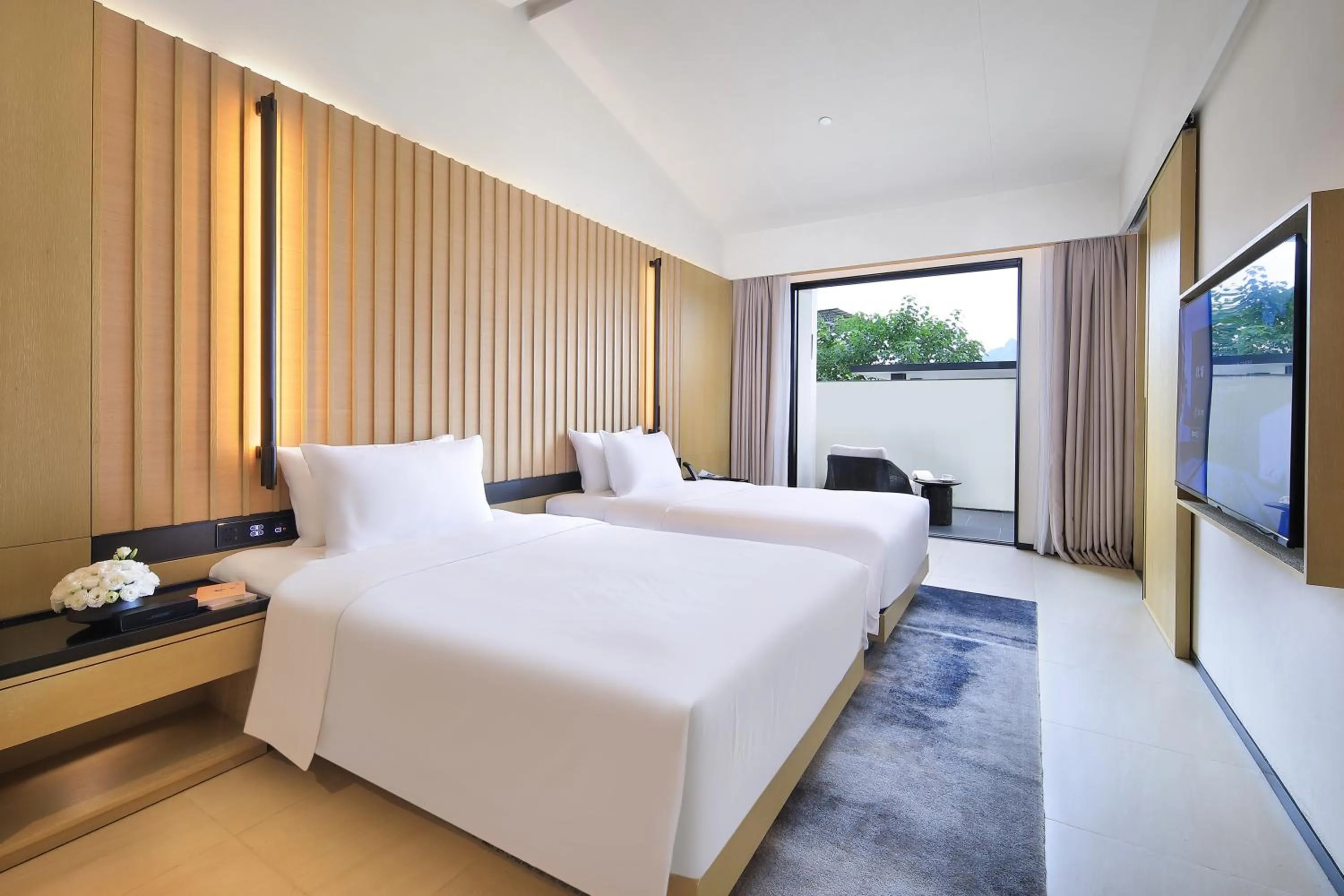 Photo of the whole room, Bed in Guilin Yangshuo Jora Hotel