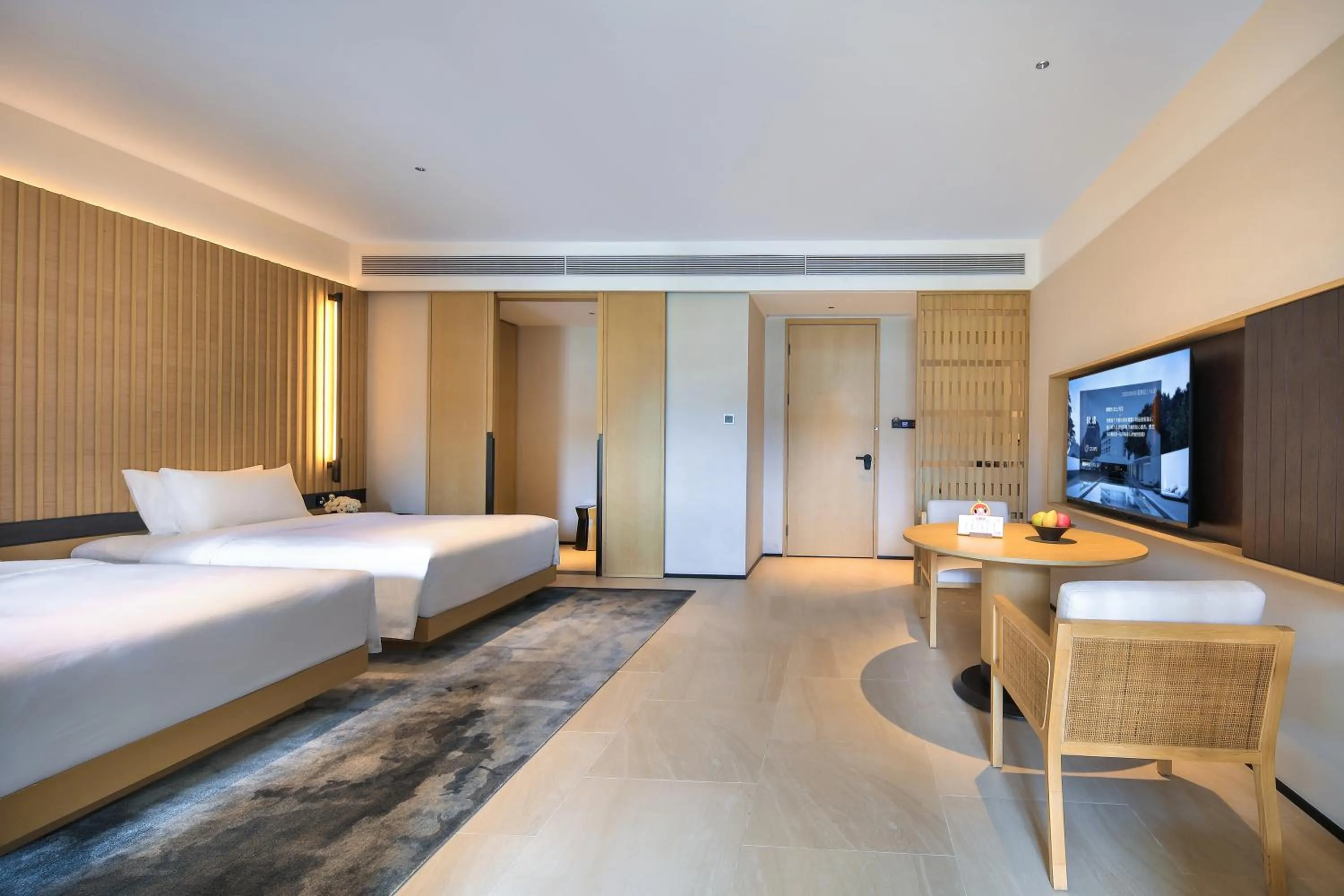 Photo of the whole room, Bed in Guilin Yangshuo Jora Hotel