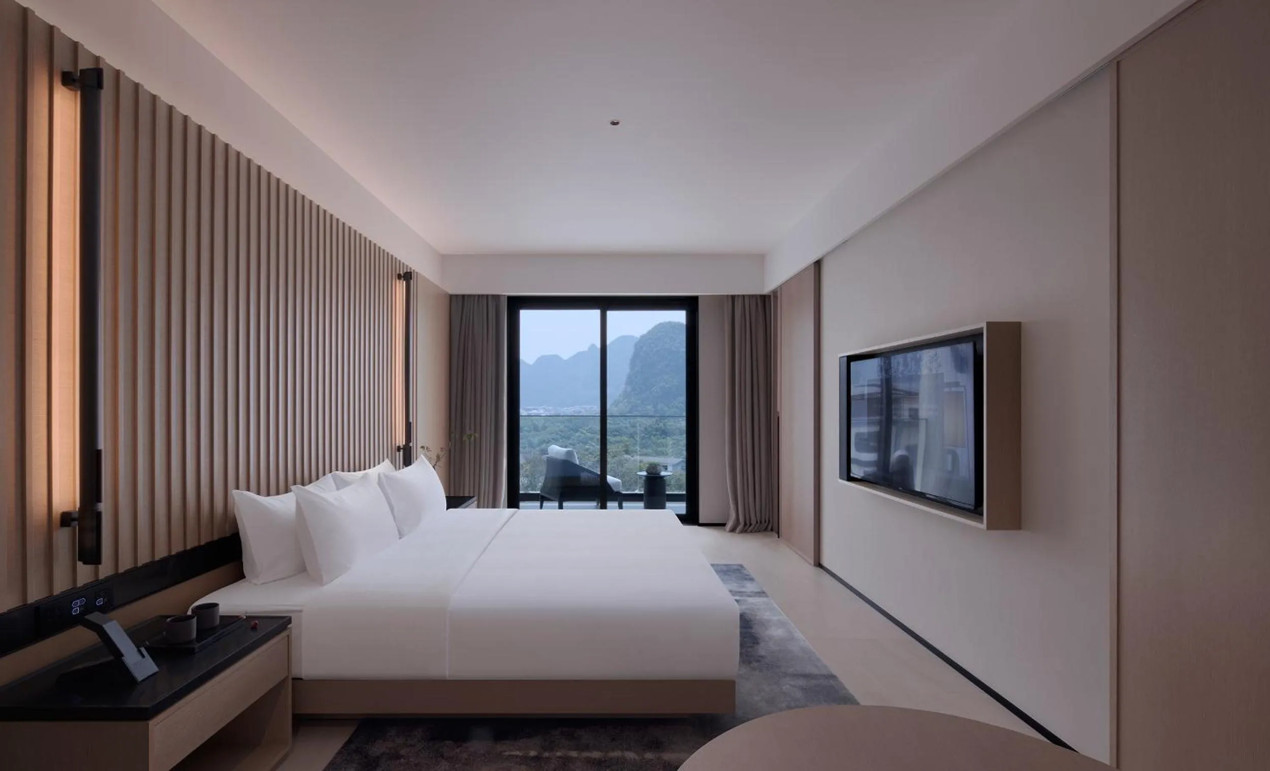 Photo of the whole room, Bed in Guilin Yangshuo Jora Hotel
