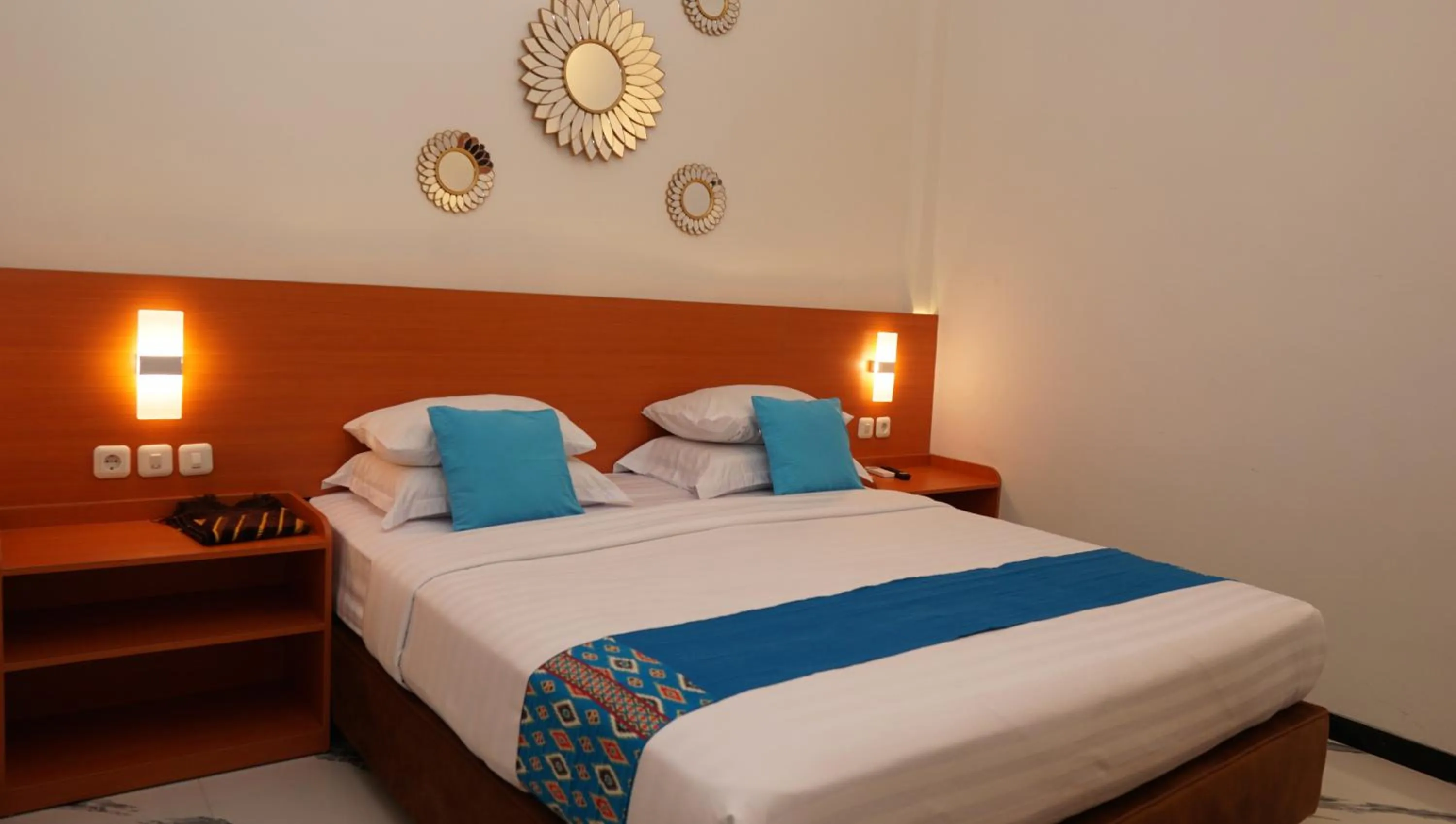 Bed in Jazz Room Kampung Inggris Syariah