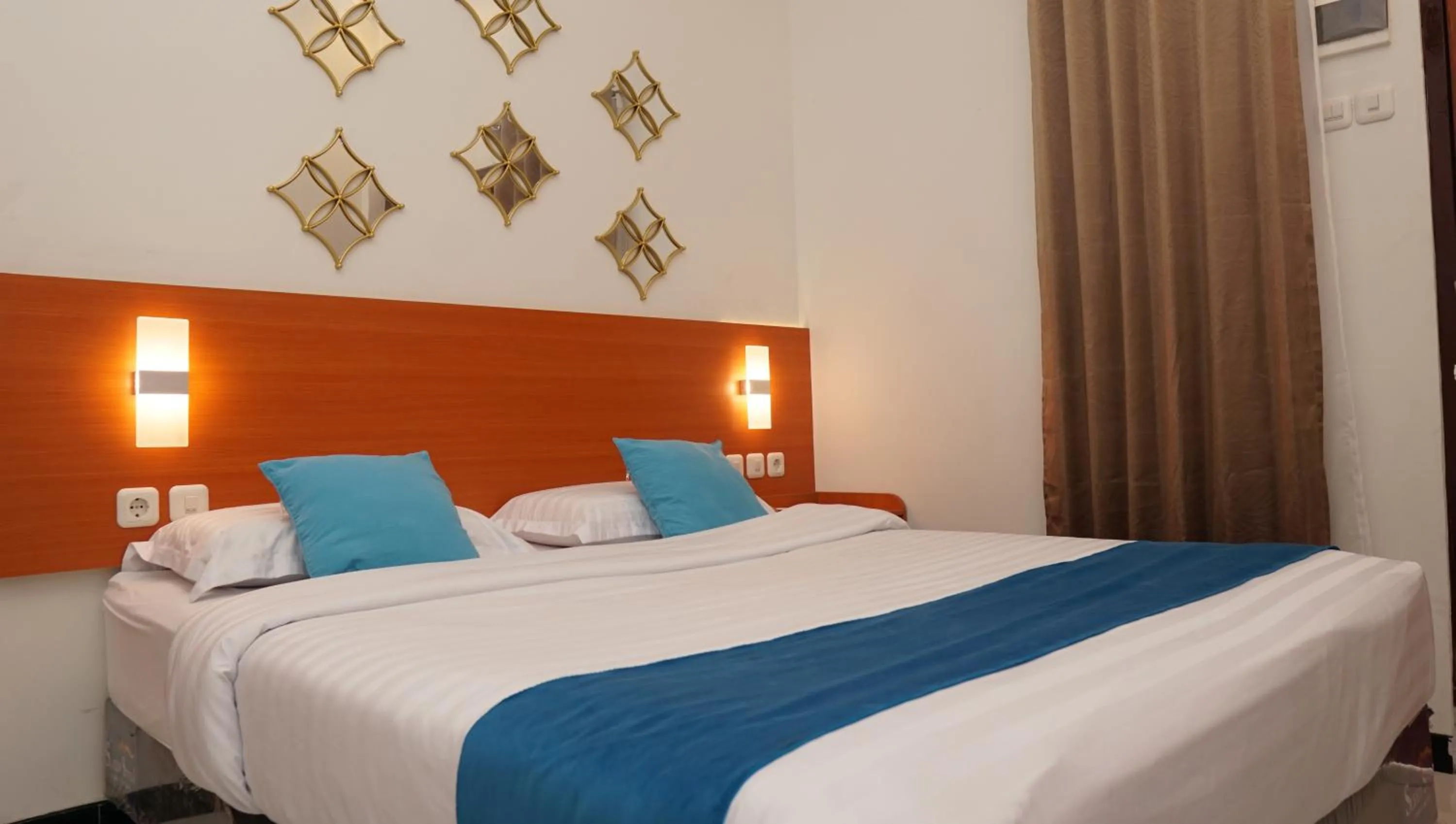 Bed in Jazz Room Kampung Inggris Syariah