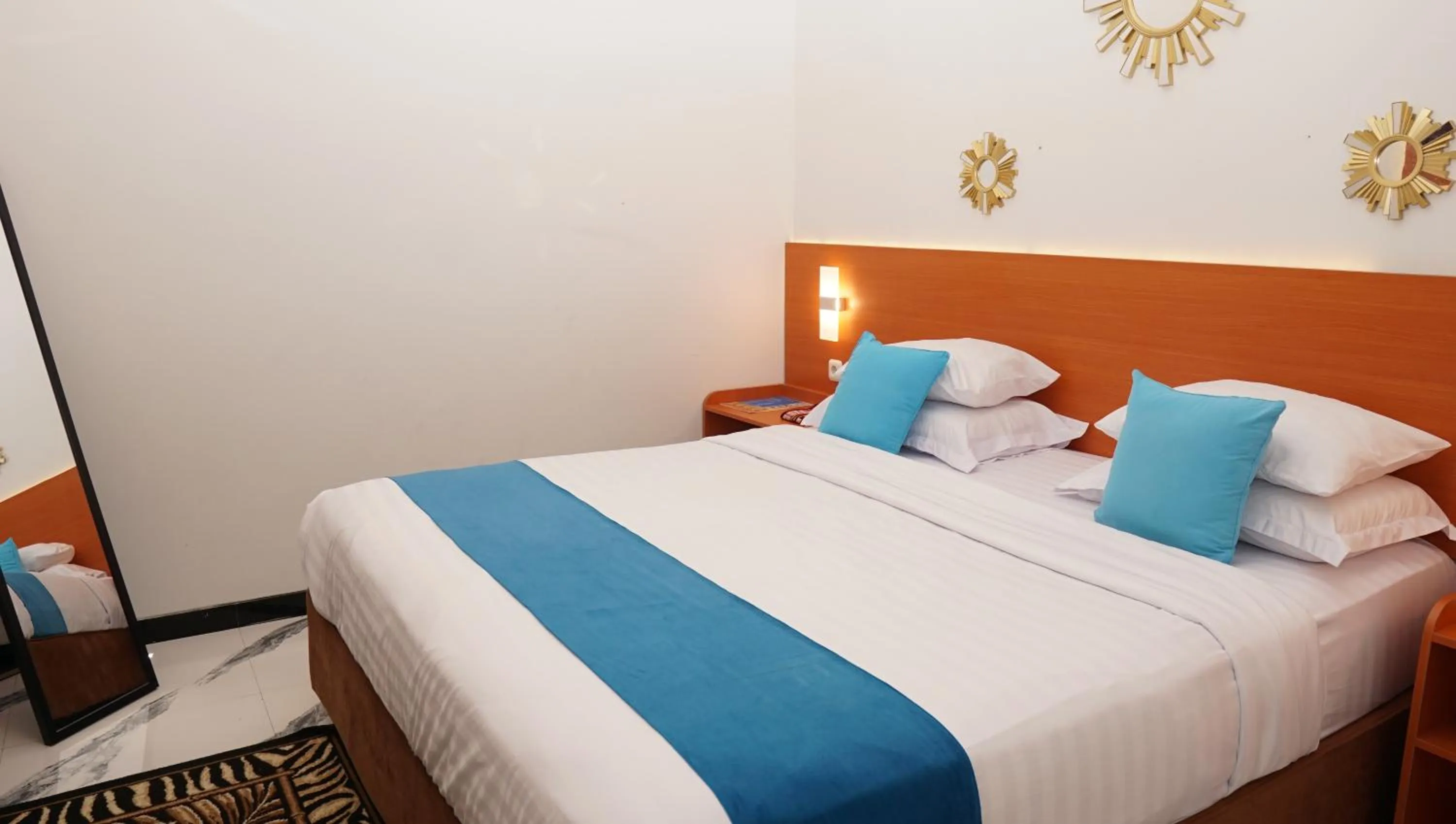 Bed in Jazz Room Kampung Inggris Syariah