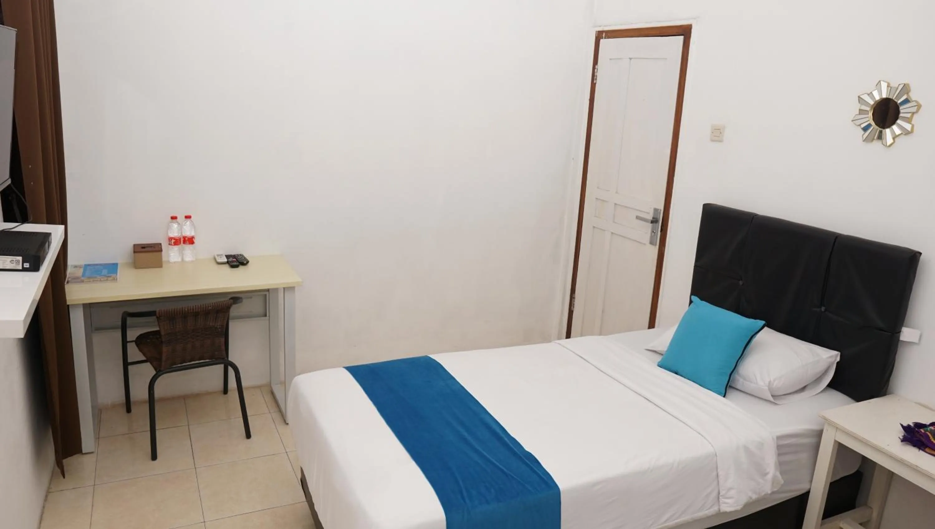 Bed in Jazz Room Kampung Inggris Syariah