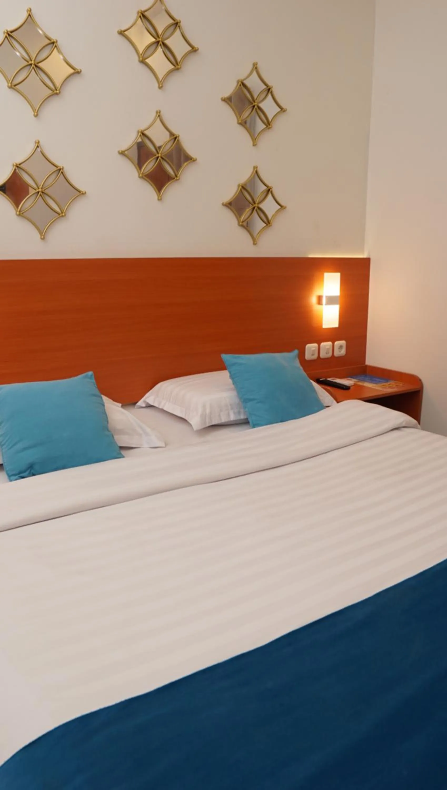 Bed in Jazz Room Kampung Inggris Syariah