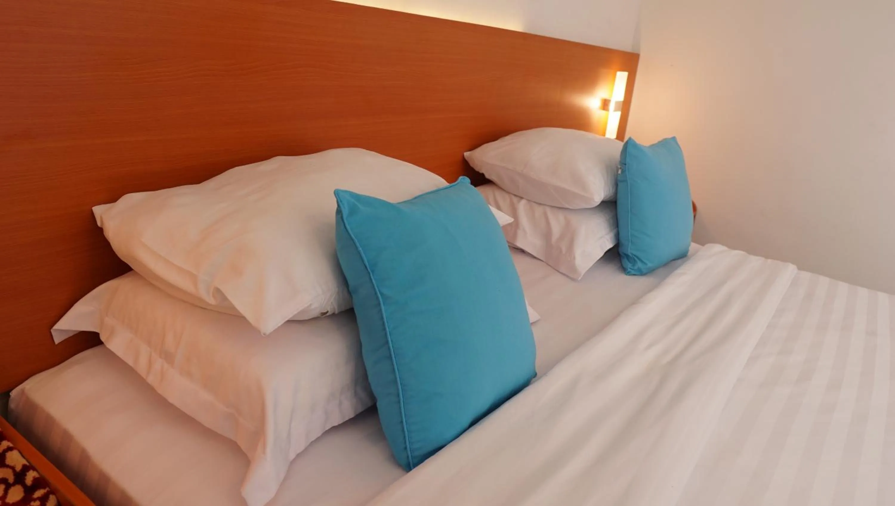 Bed in Jazz Room Kampung Inggris Syariah