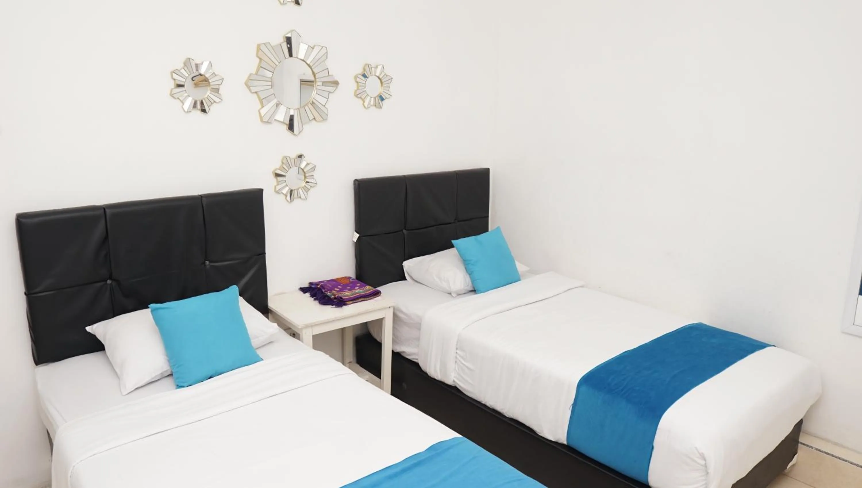 Bed in Jazz Room Kampung Inggris Syariah