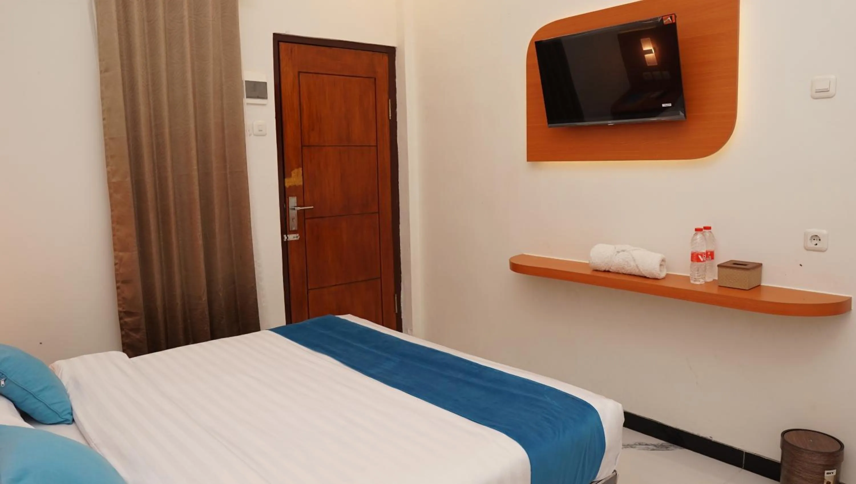 Bed in Jazz Room Kampung Inggris Syariah