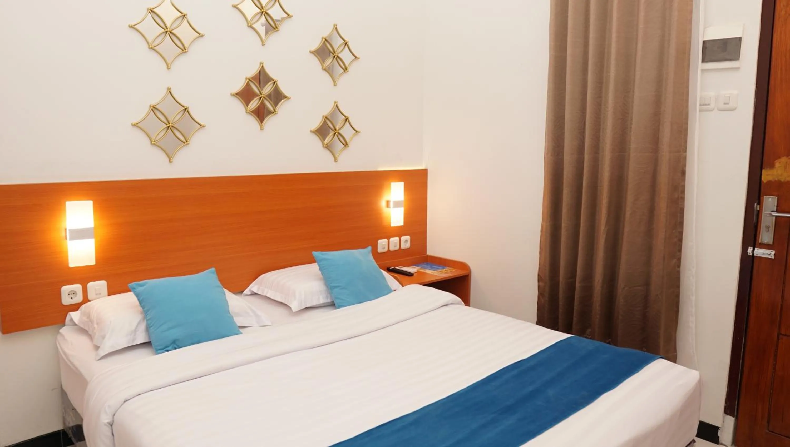 Bed in Jazz Room Kampung Inggris Syariah