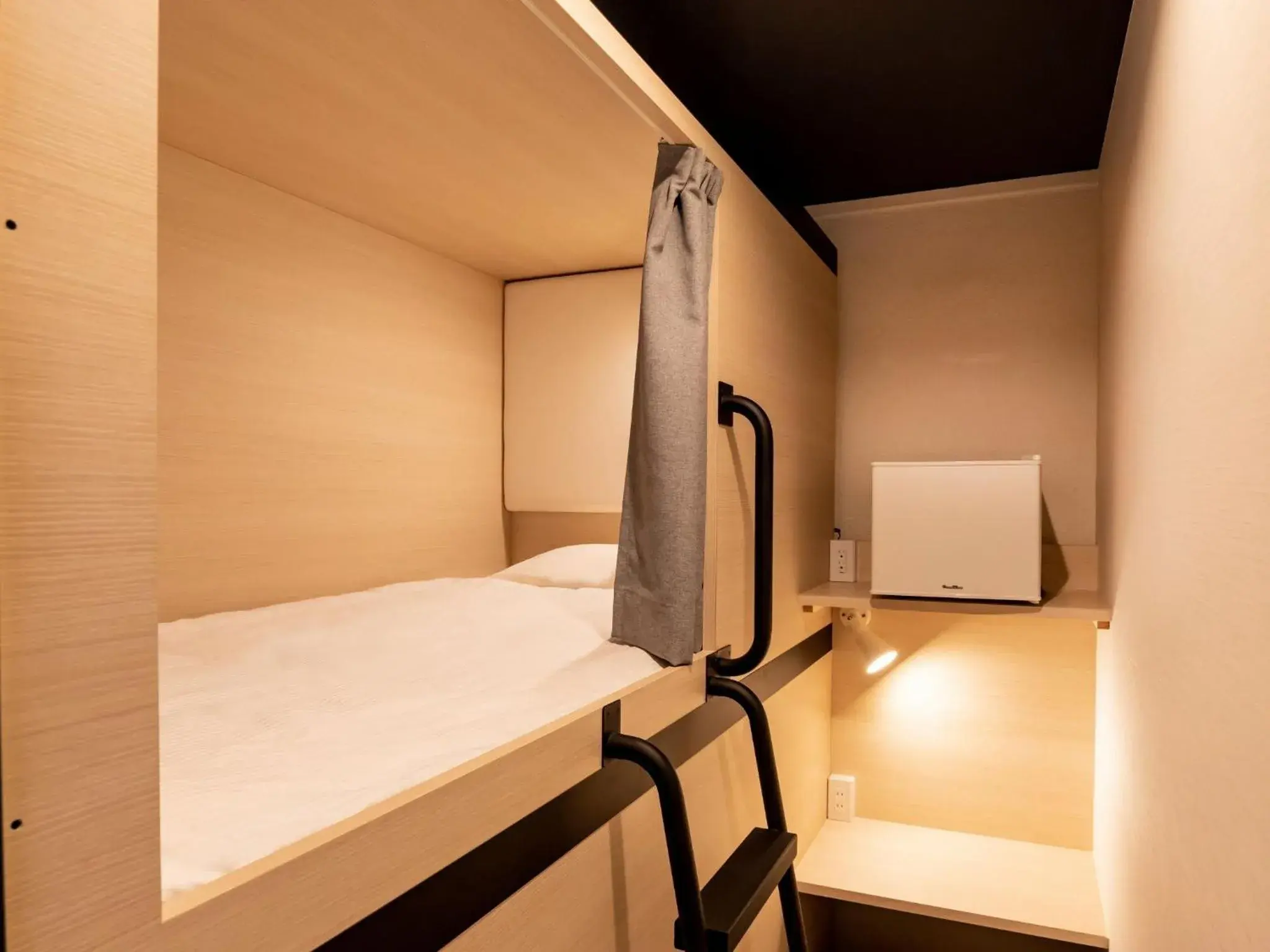 Bed in CABIN&HOTEL CONSTANT NAHA Bed in CABIN&HOTEL CONSTANT NAHA