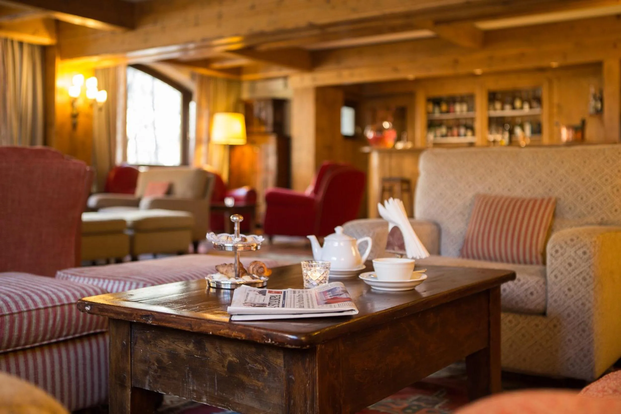 Communal lounge/ TV room in Gran Baita Hotel & Wellness