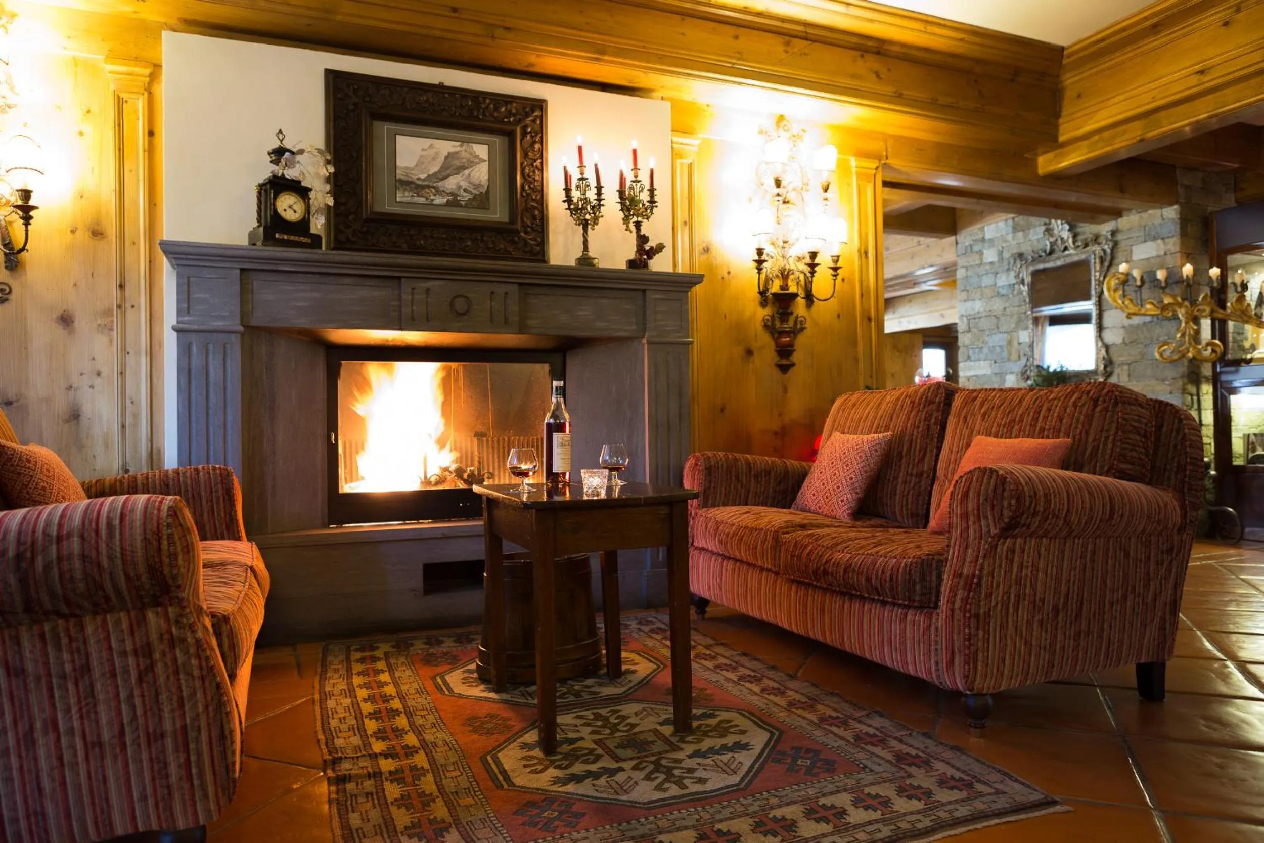 Communal lounge/ TV room in Gran Baita Hotel & Wellness