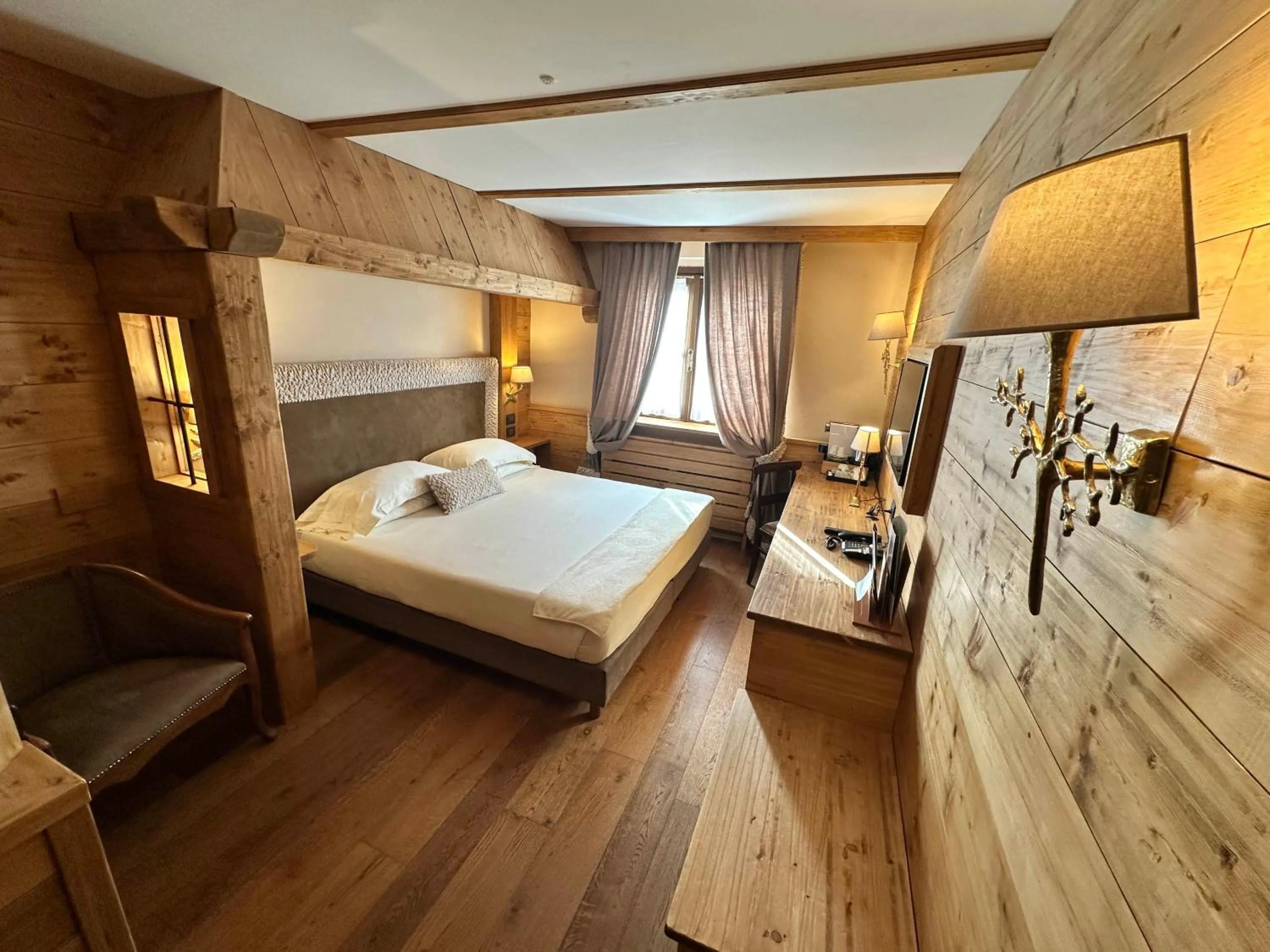 furniture, Bed in Gran Baita Hotel & Wellness