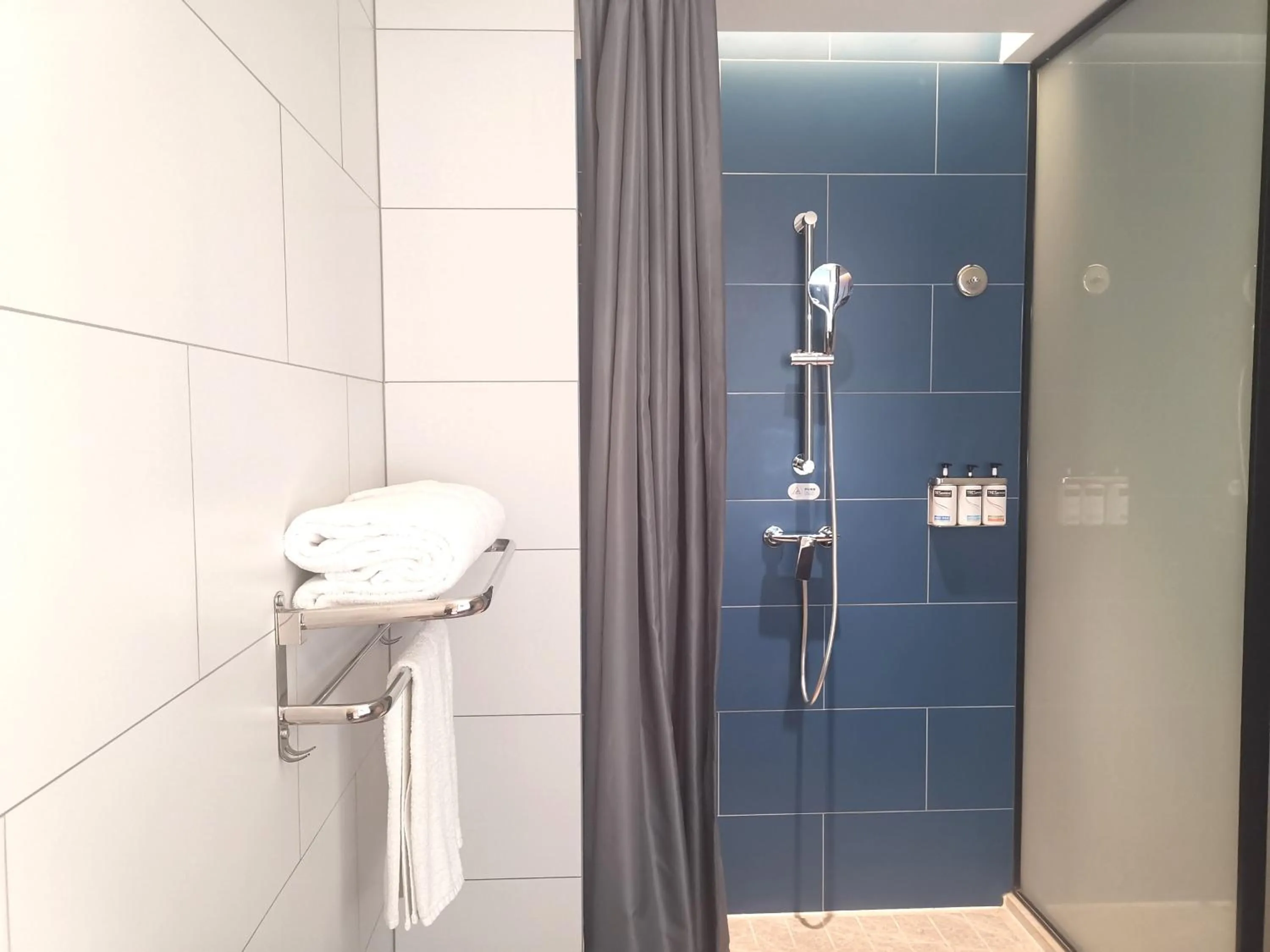 Shower in Holiday Inn Express Shanghai Expo Centre by IHG
