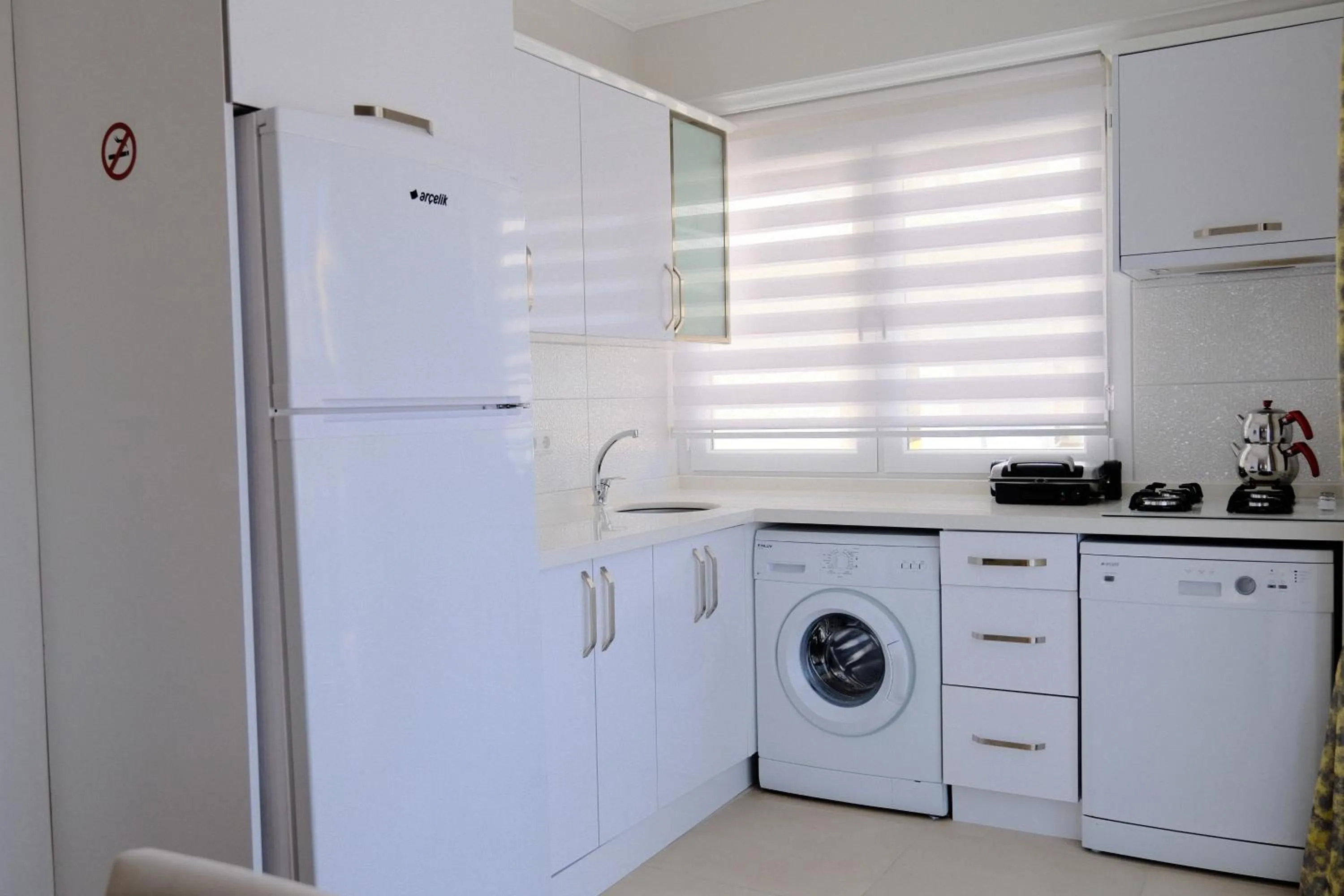Kitchen or kitchenette in Ozgur City Residence
