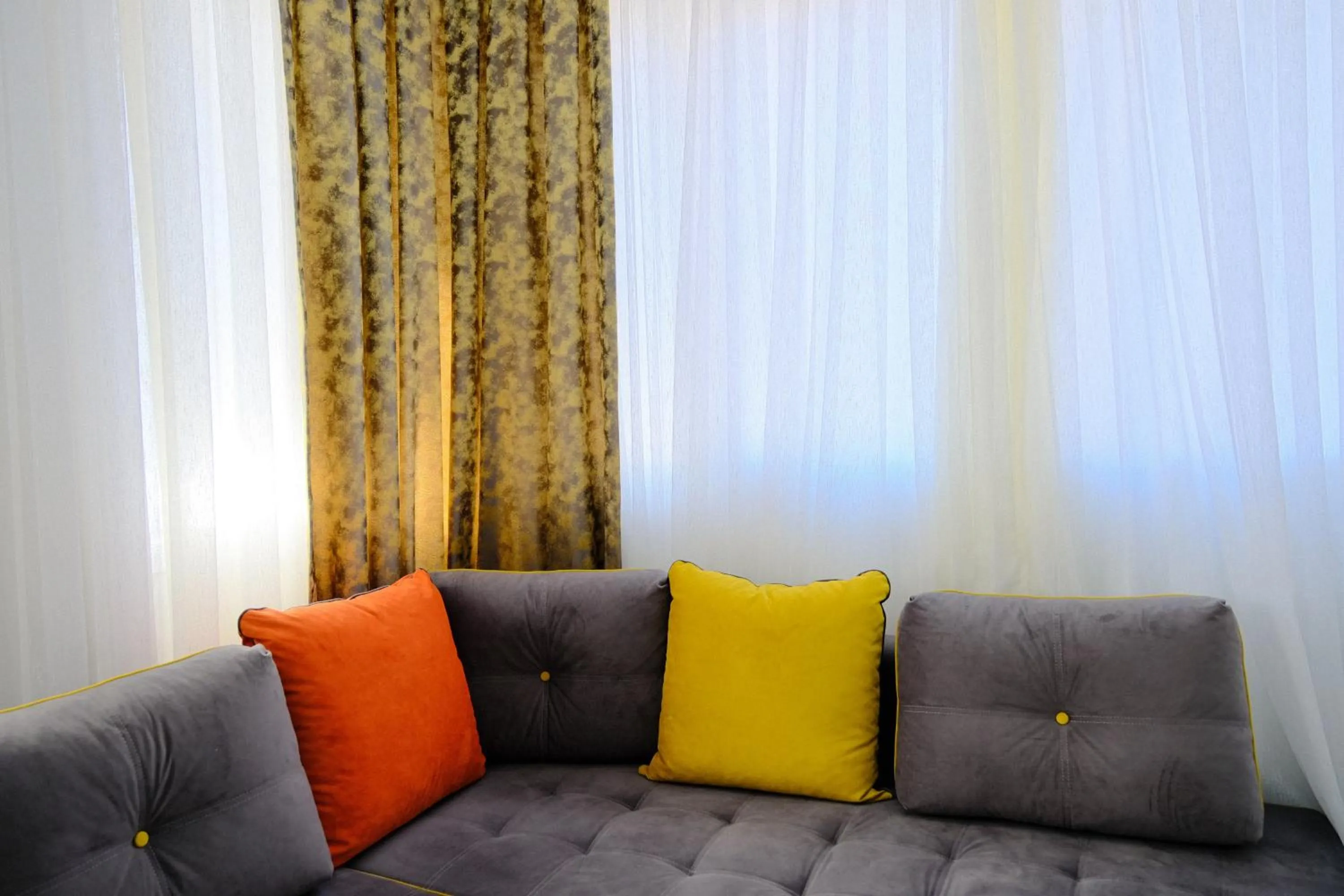 Seating area in Ozgur City Residence