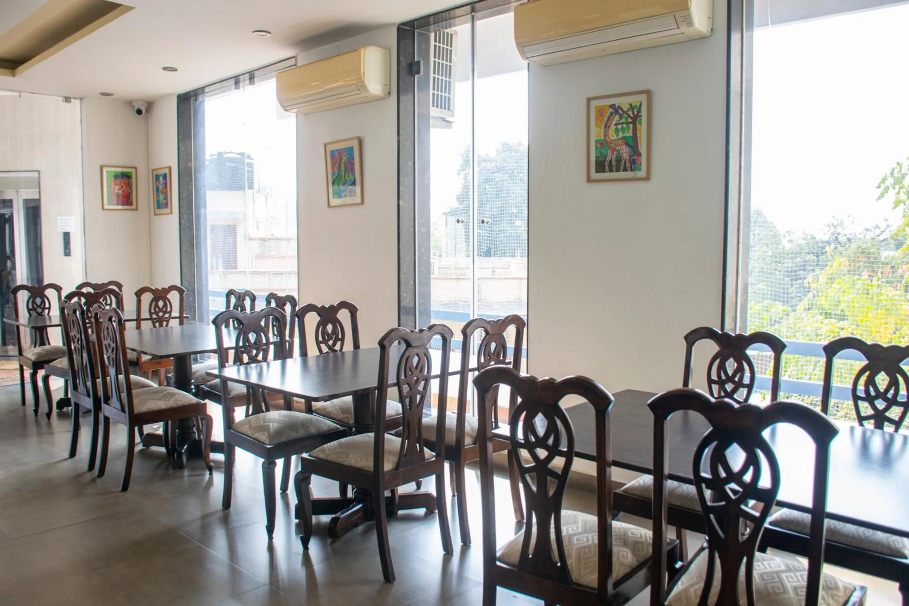 Dining area in Girisadan - A City Centre Boutique Hotel