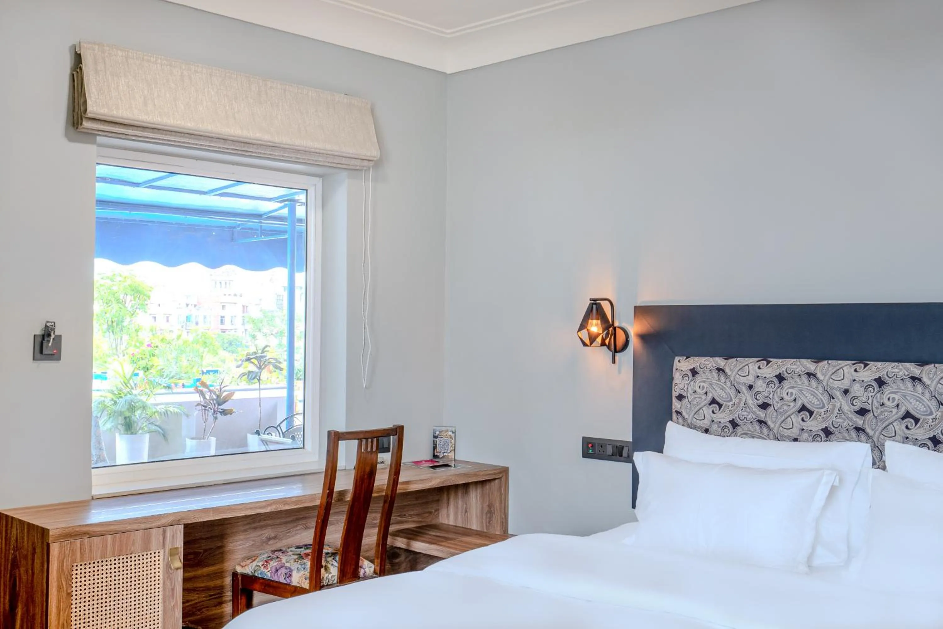 Bed in Girisadan - A City Centre Boutique Hotel