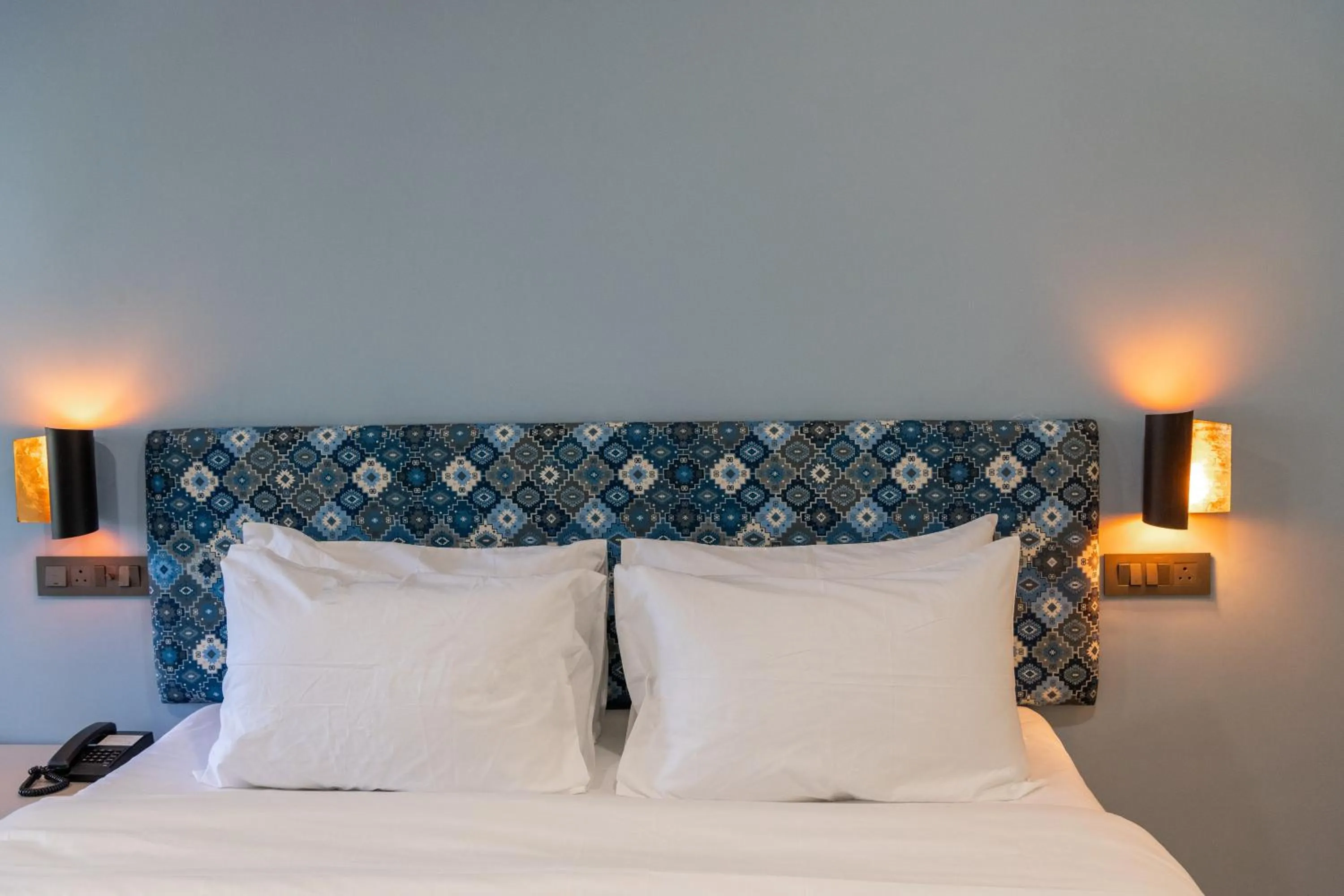 Bed in Girisadan - A City Centre Boutique Hotel