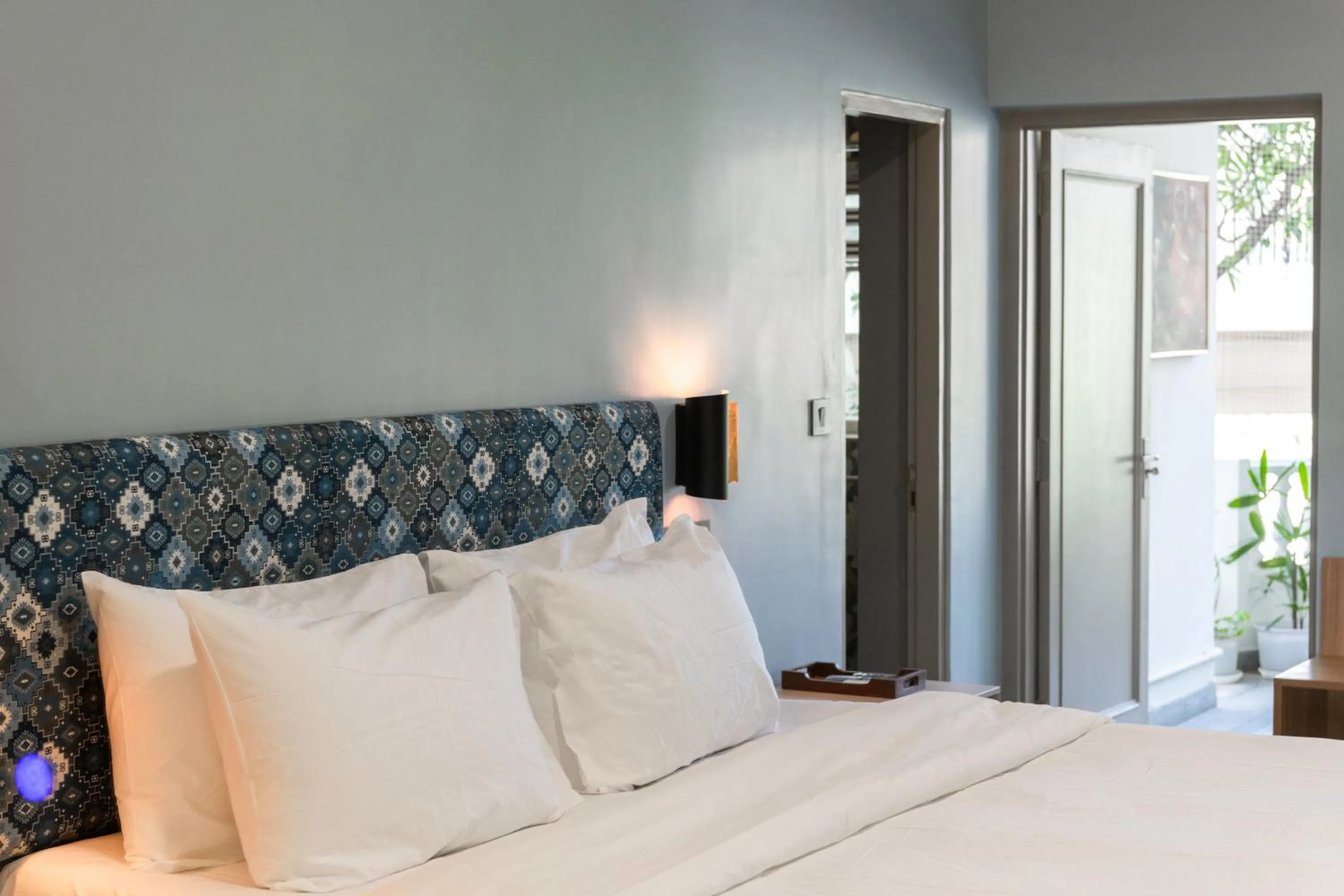 Bed in Girisadan - A City Centre Boutique Hotel