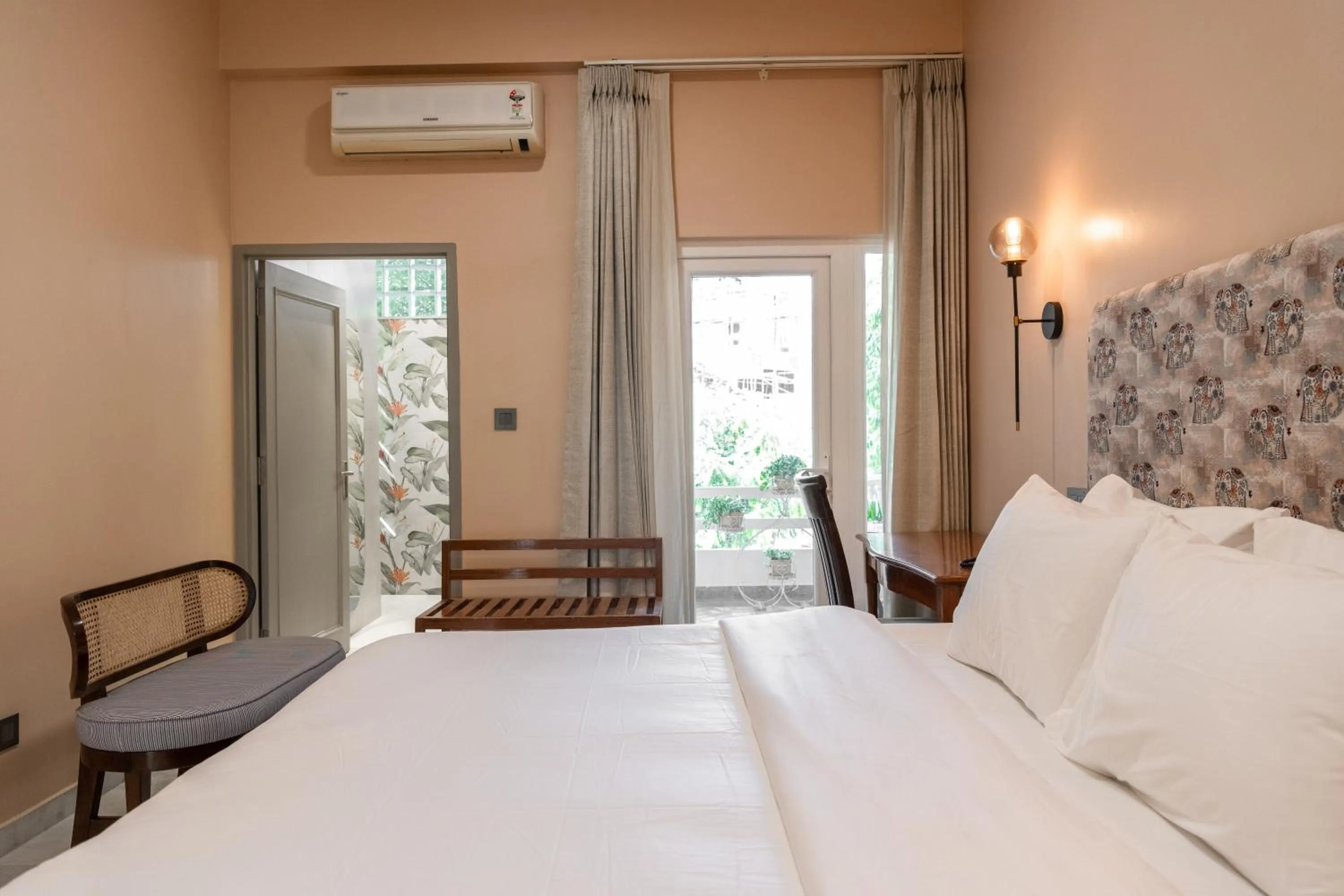 Bed in Girisadan - A City Centre Boutique Hotel