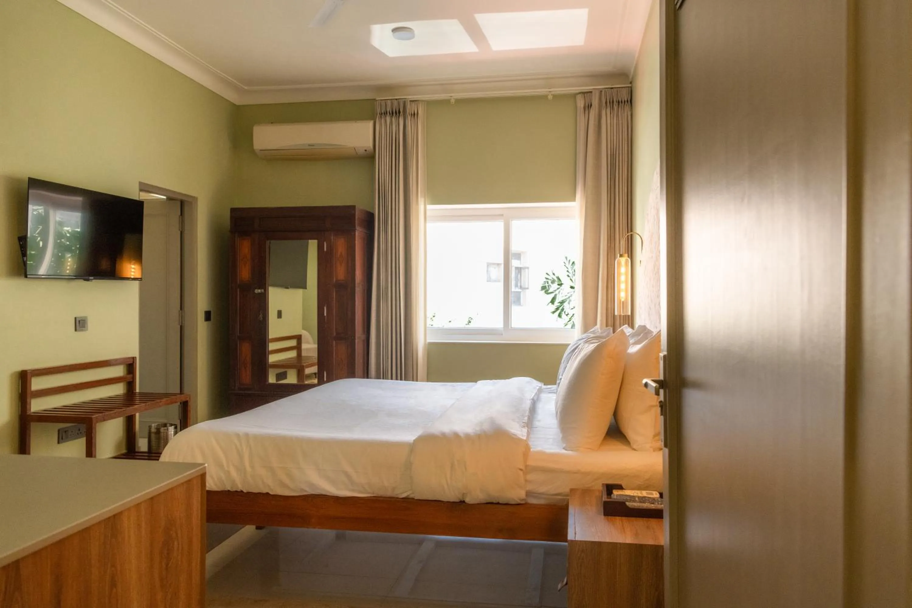 Bed in Girisadan - A City Centre Boutique Hotel