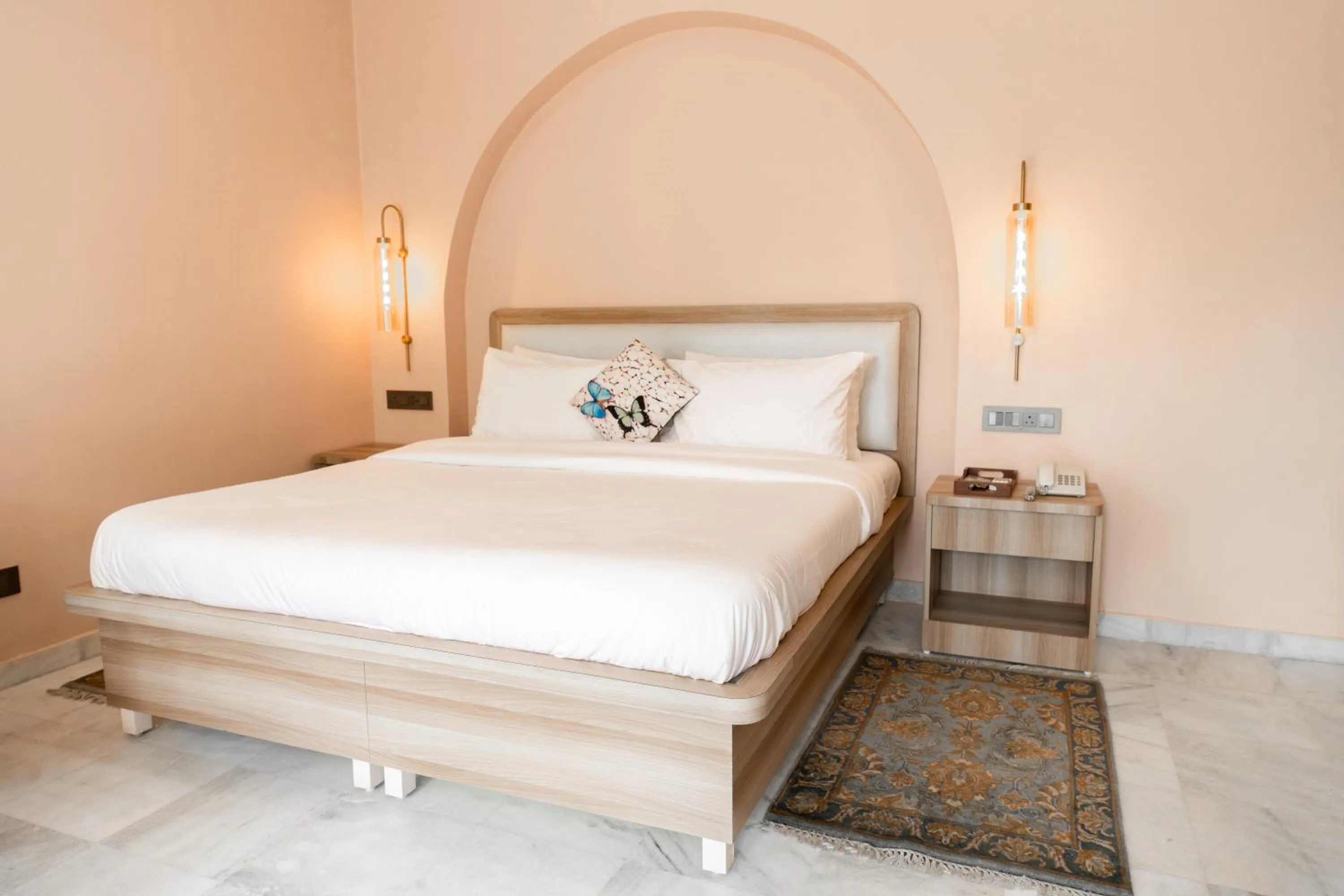 Bed in Girisadan - A City Centre Boutique Hotel