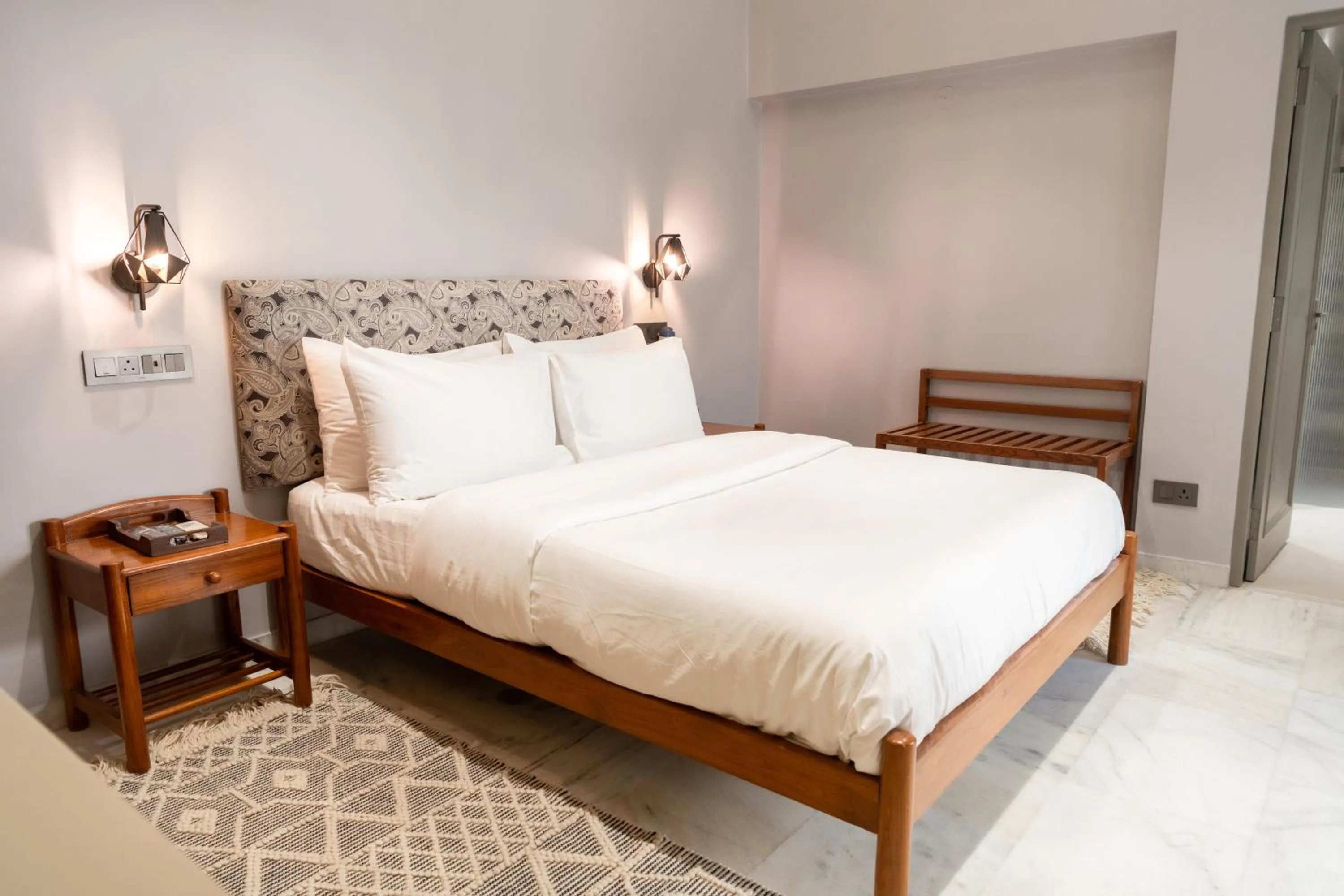Bed in Girisadan - A City Centre Boutique Hotel
