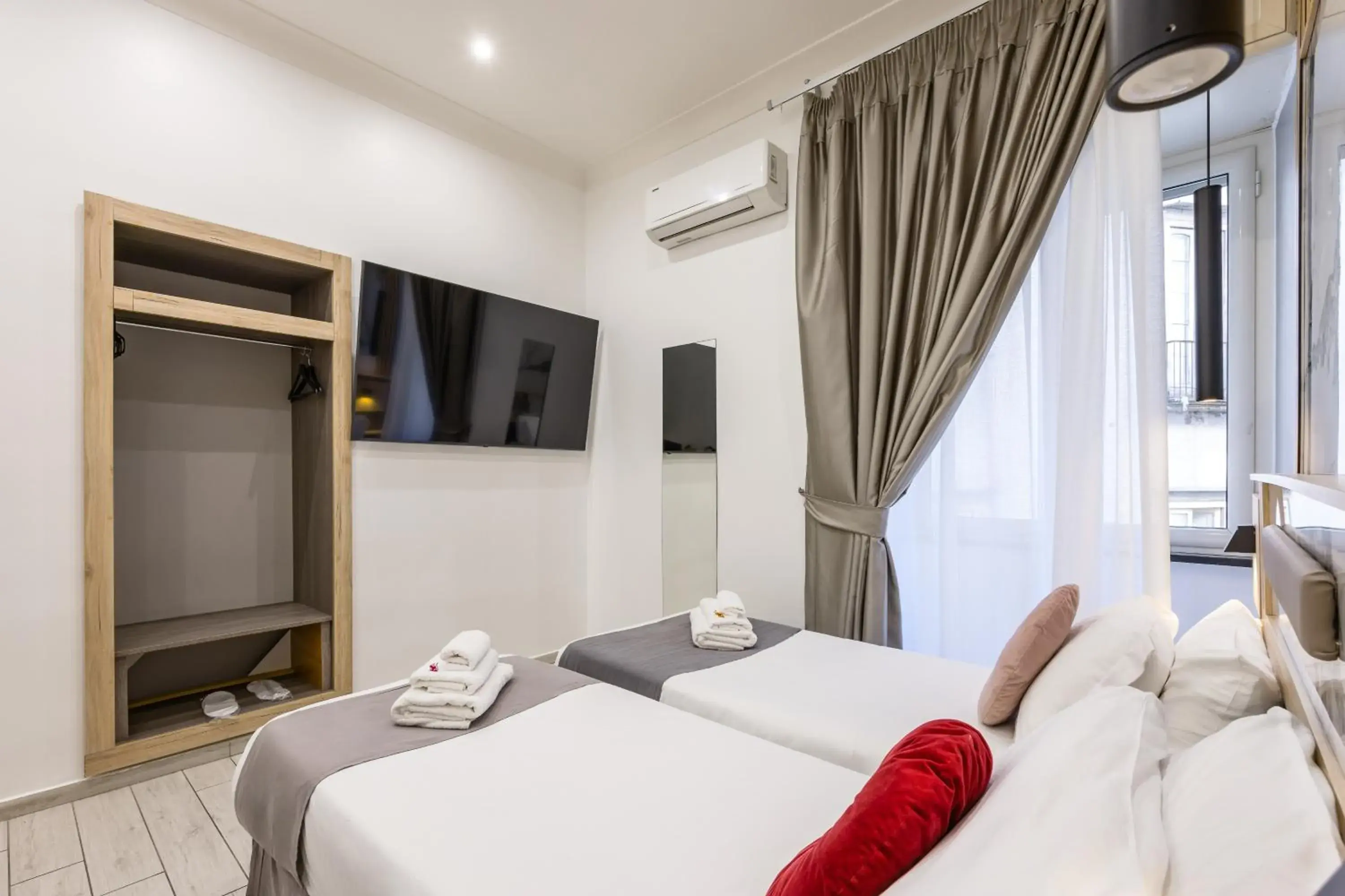 Bed in Hotel Bella Napoli Bed in Hotel Bella Napoli