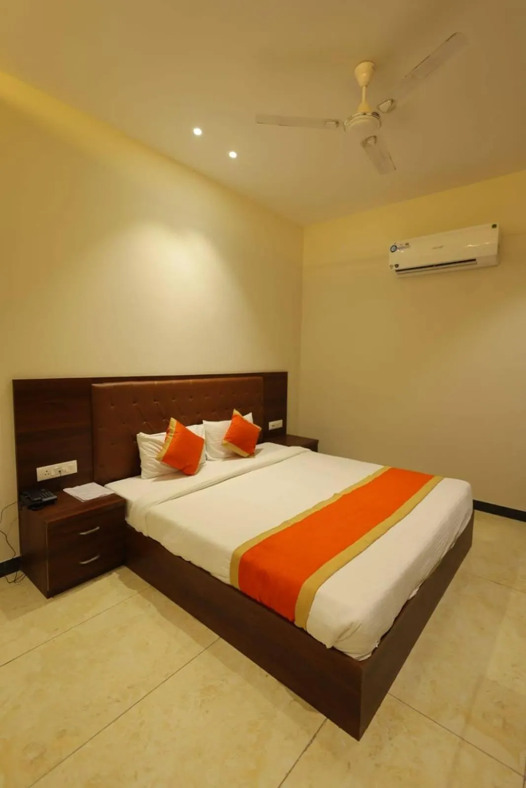 Bed in The Grand Tree Hotel