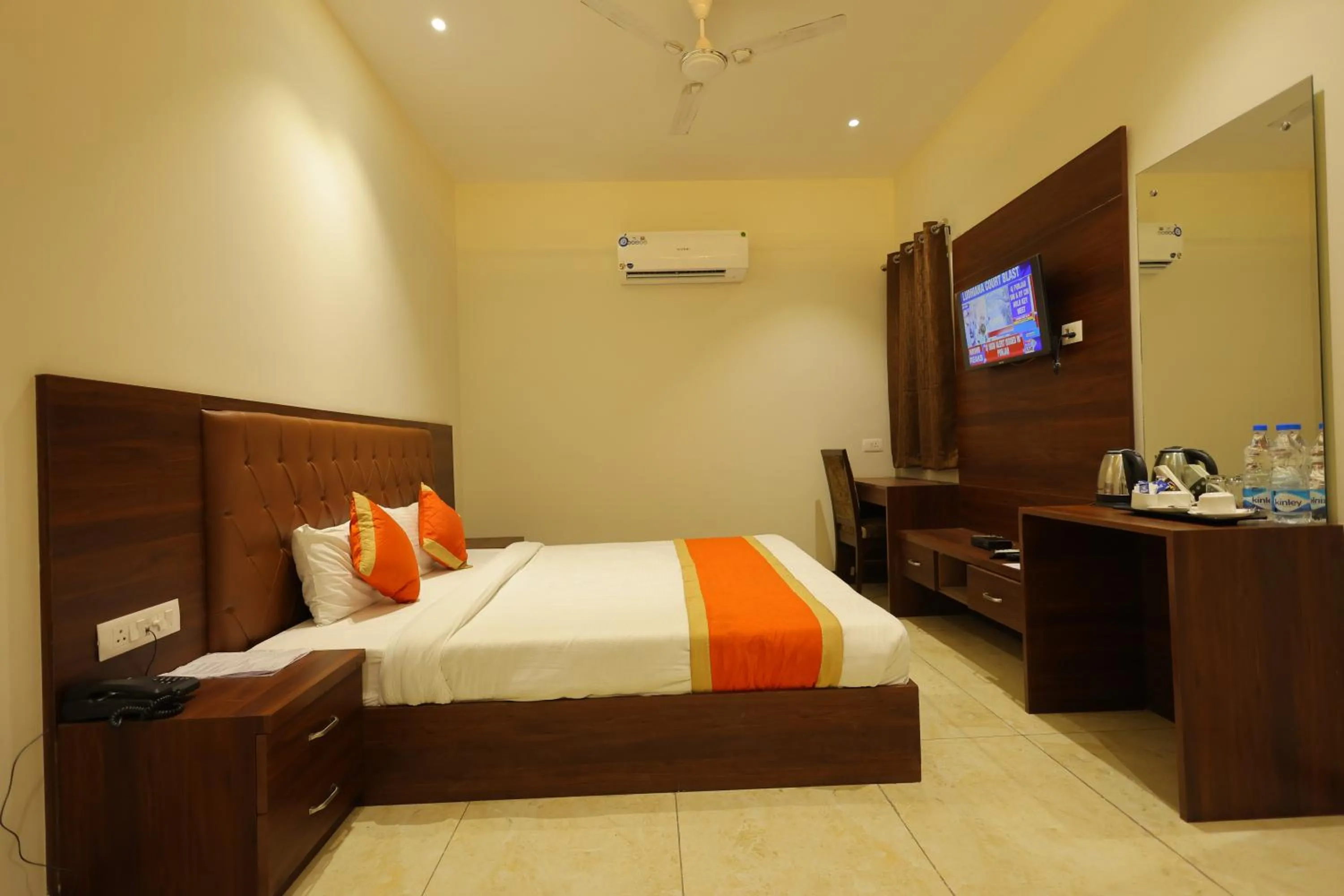 Bed in The Grand Tree Hotel