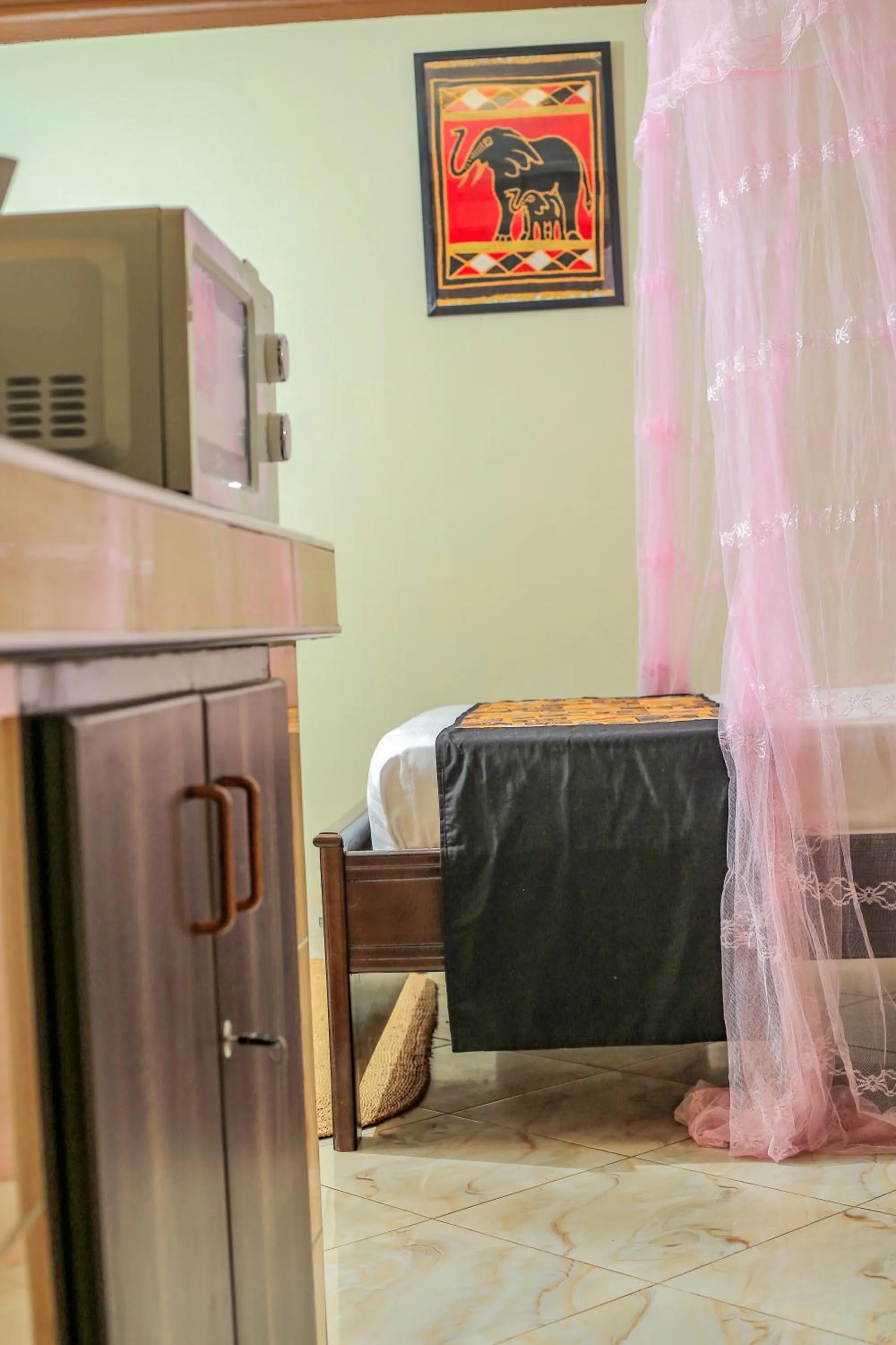 Bed in Triple Tee Gardens & Accomodation