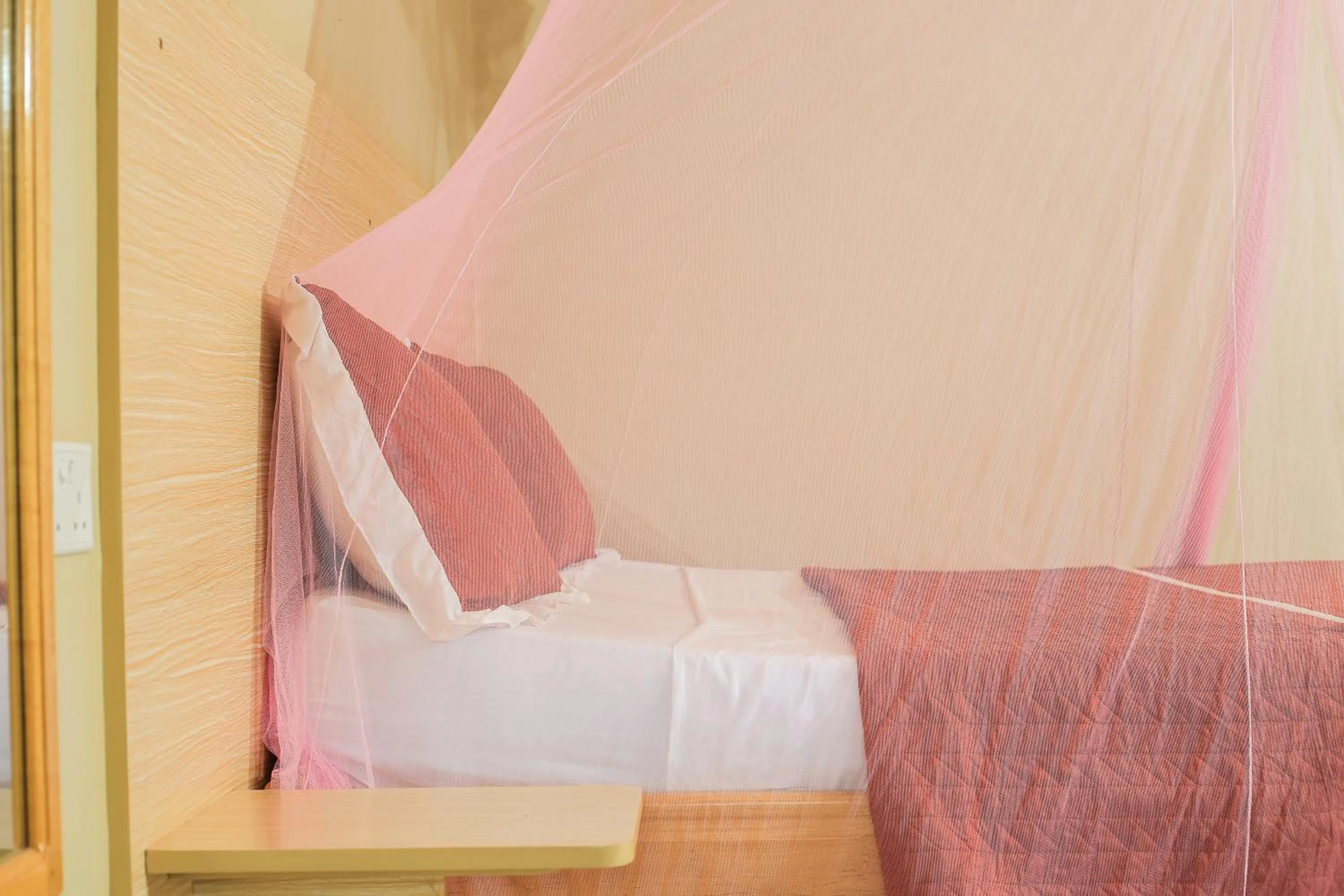 Bed in Triple Tee Gardens & Accomodation