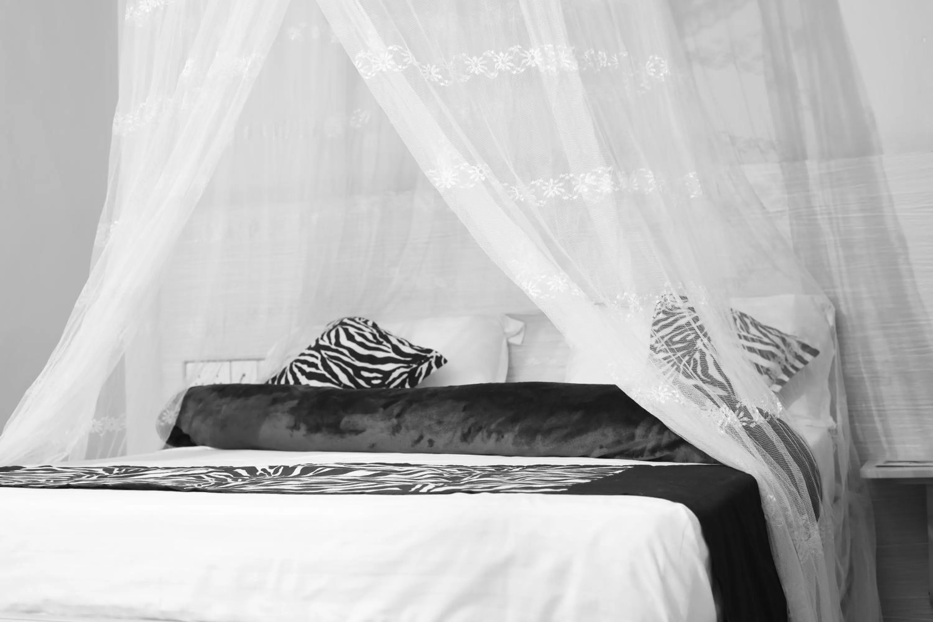 Bed in Triple Tee Gardens & Accomodation