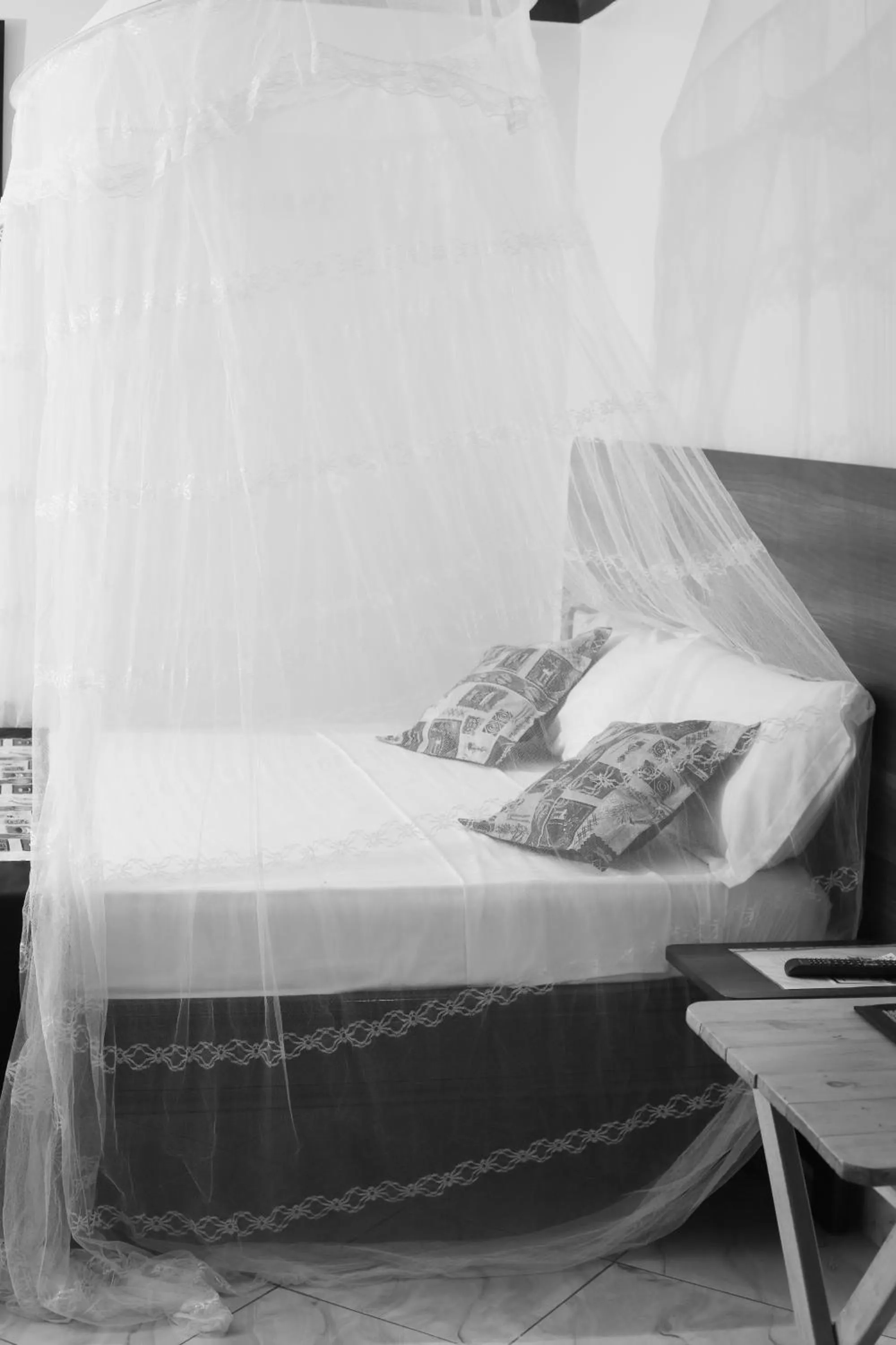 Bed in Triple Tee Gardens & Accomodation