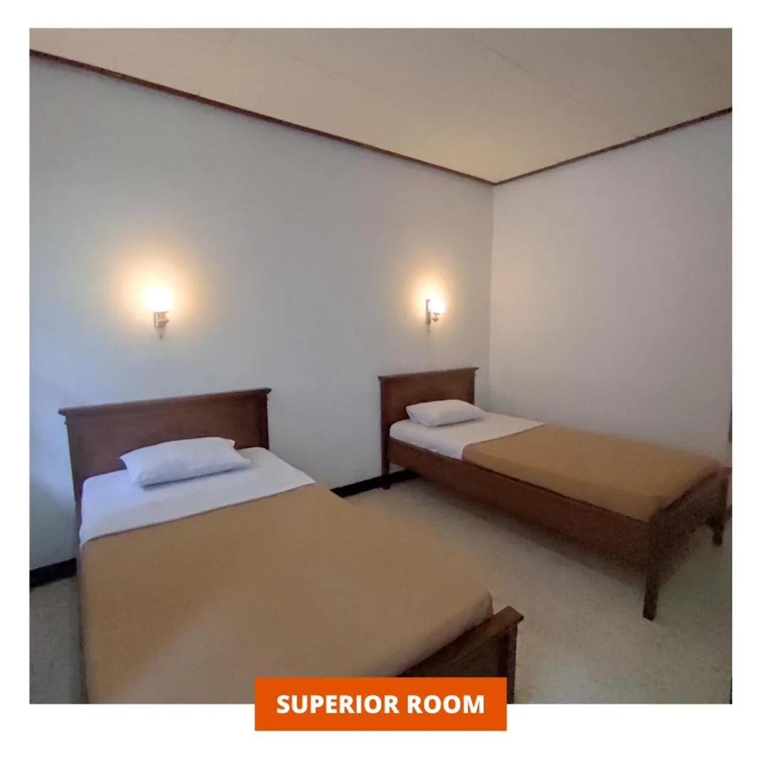 Bed in Wanitatama Hotel & Convention Hall