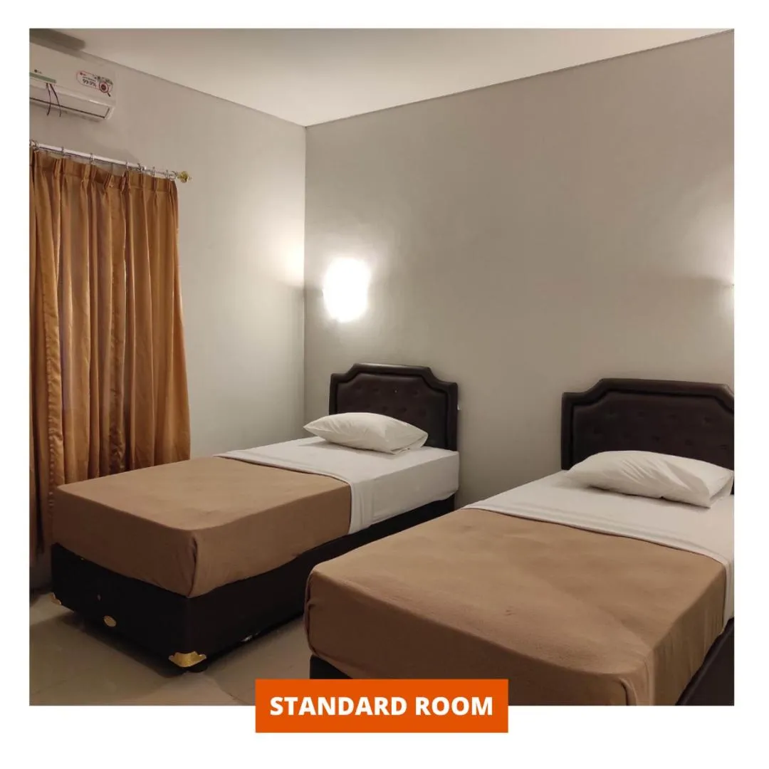Bed in Wanitatama Hotel & Convention Hall