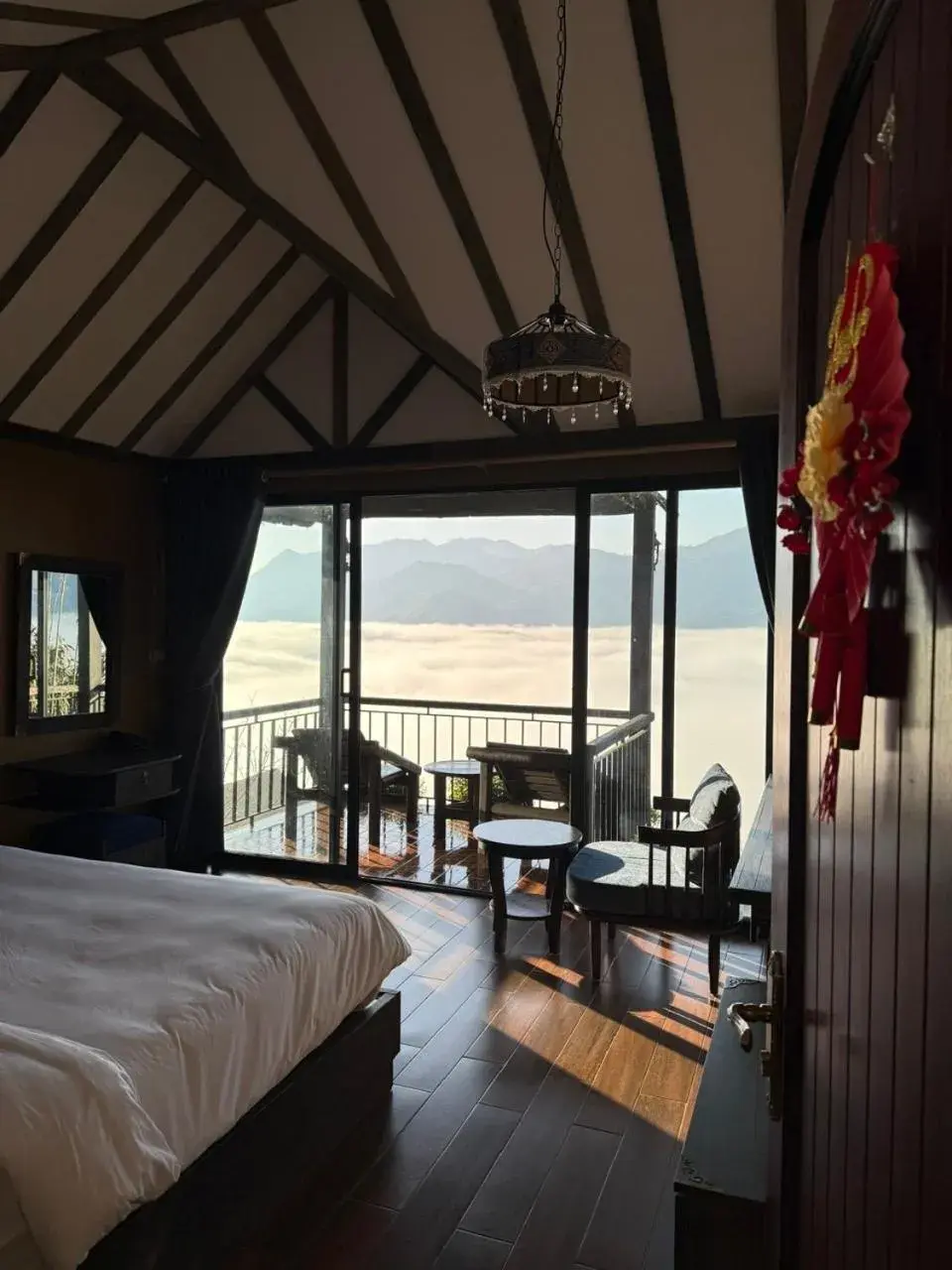 Balcony/Terrace, Bed in The Mong Village Resort & Spa Balcony/Terrace, Bed in The Mong Village Resort & Spa