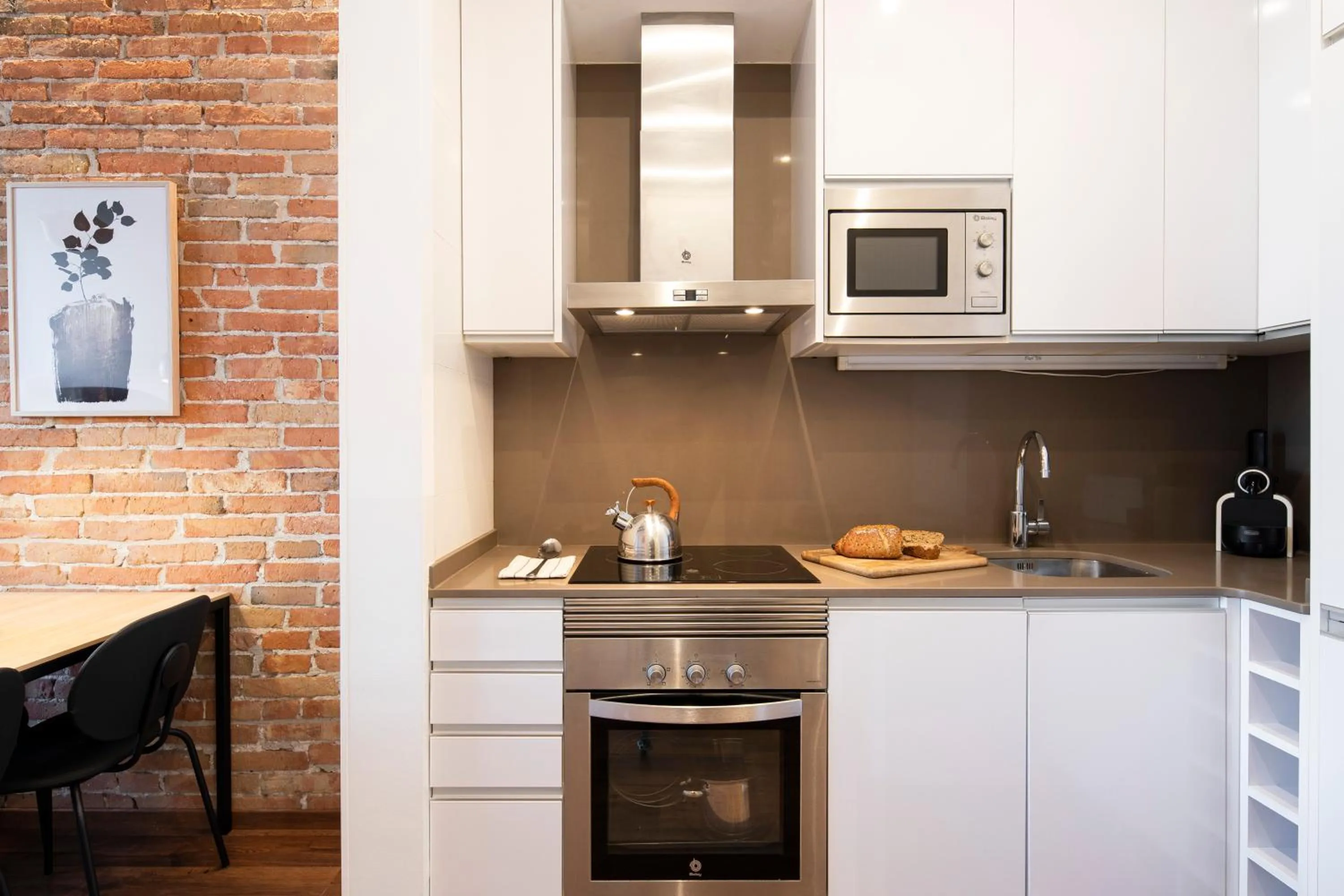 Kitchen or kitchenette in Aspasios Market Balconies Apartments