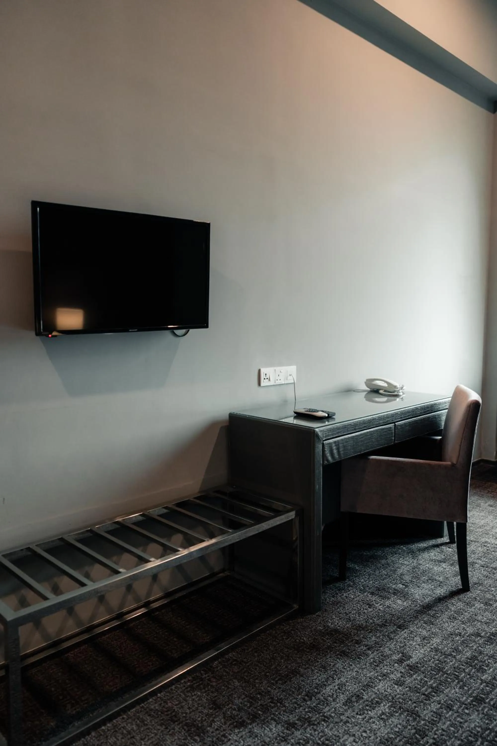 Seating area, Bed in Le'venue Hotel