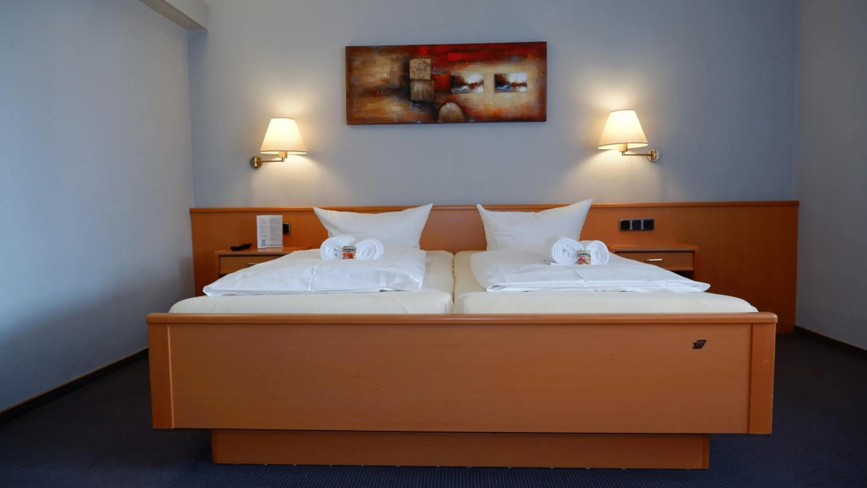 Photo of the whole room, Bed in Hotel Walzwerk