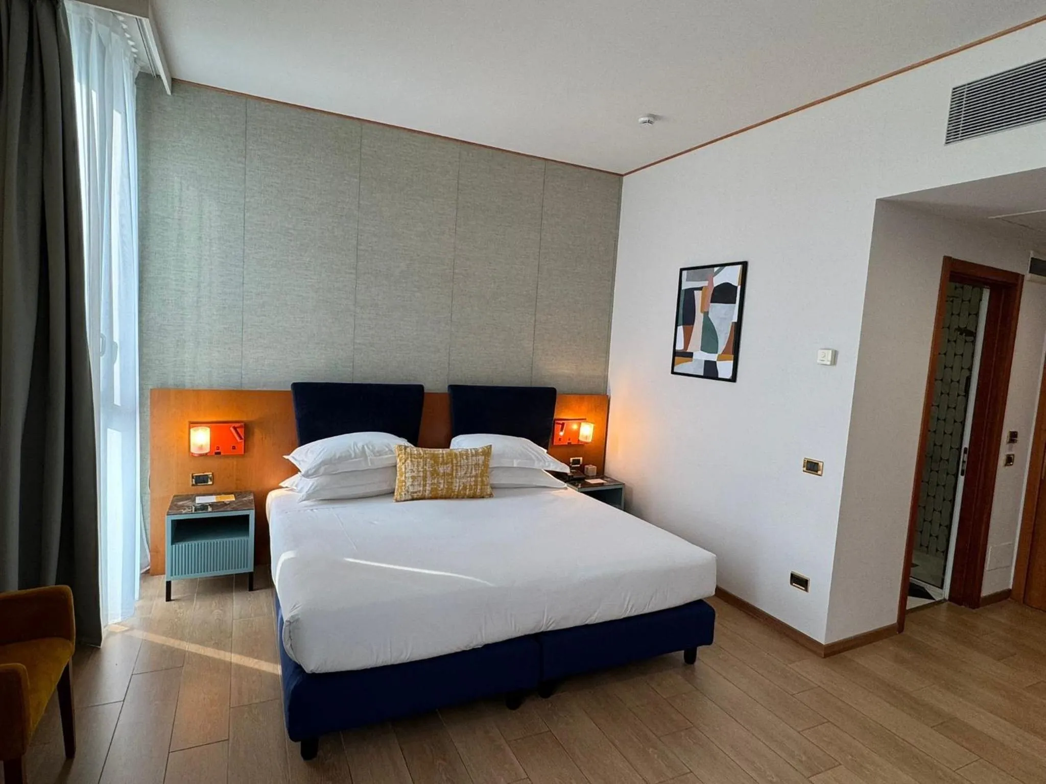 Photo of the whole room, Bed in voco Parma & Congressi by IHG