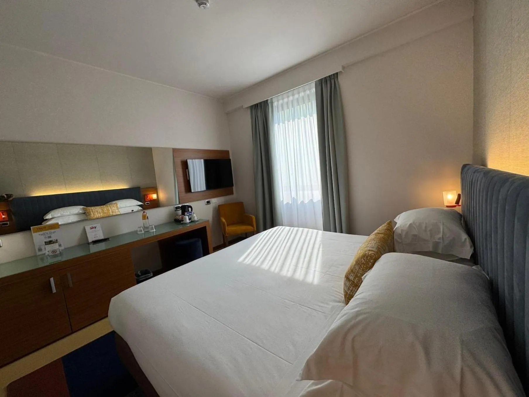 Photo of the whole room, Bed in voco Parma & Congressi by IHG