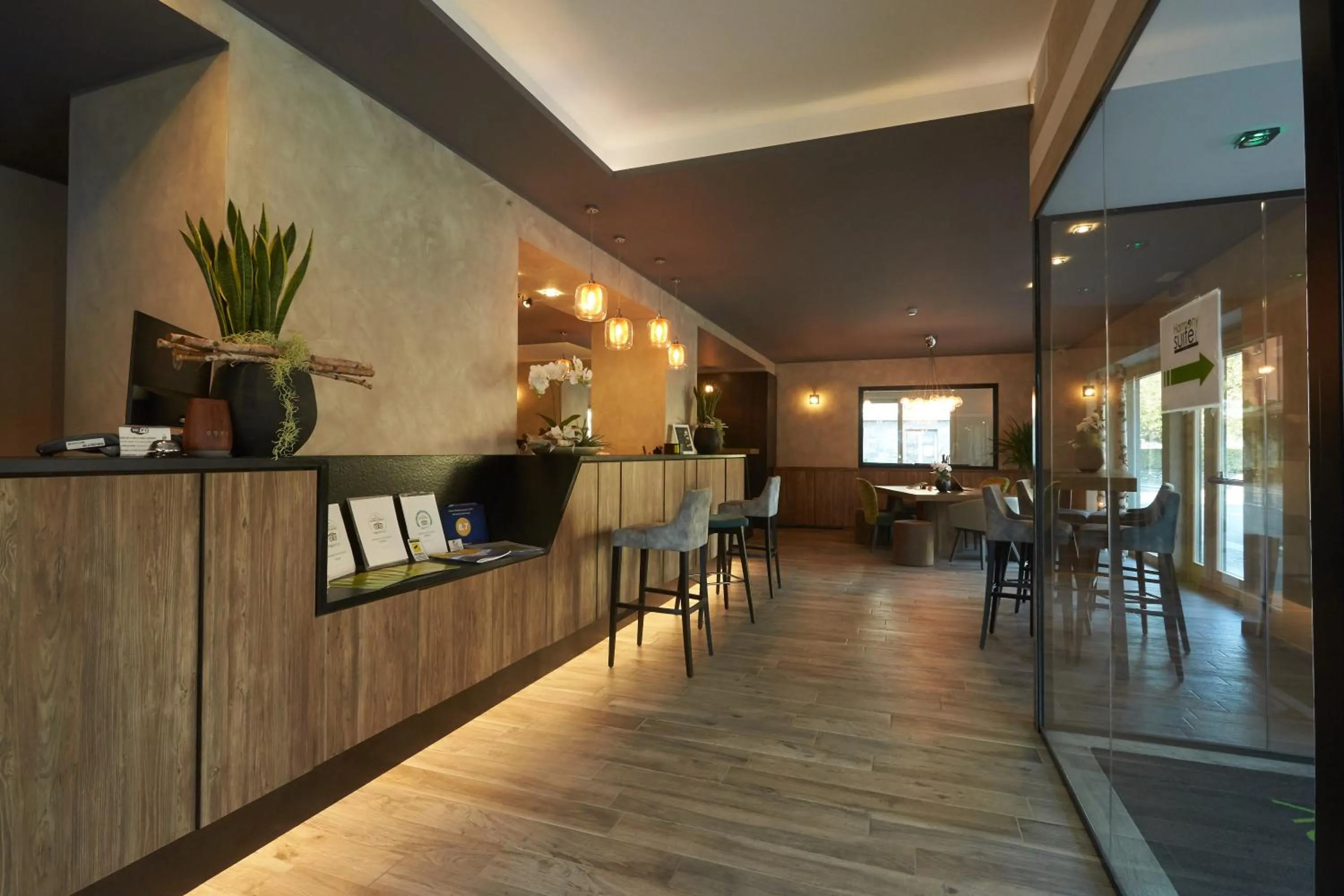 Lobby or reception in Harmony Suite Hotel